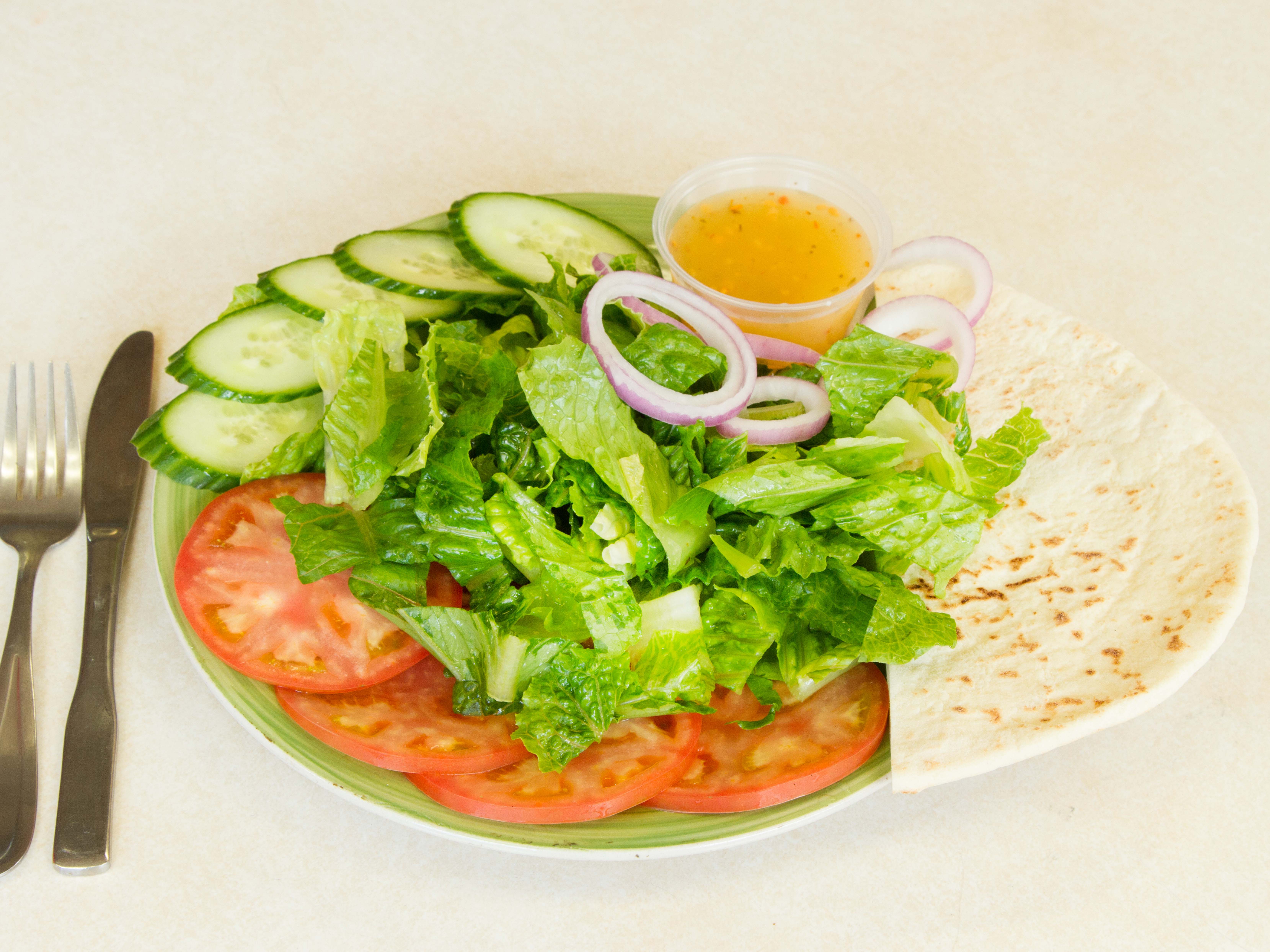 Order Garden Salad food online from Gaya Pizzeria store, Somerville on bringmethat.com