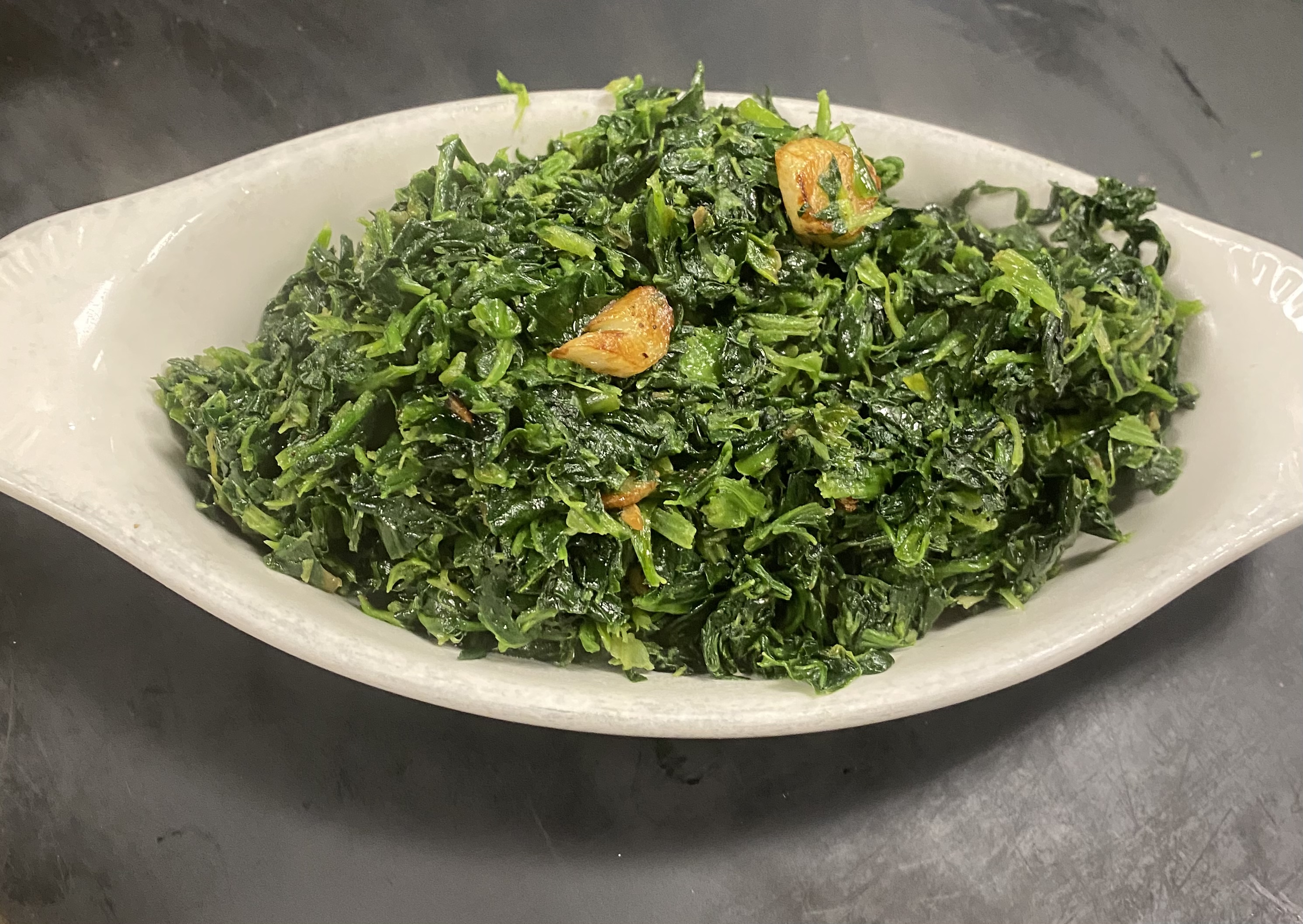 Order Sautéed Spinach food online from Famous Calabria store, New York on bringmethat.com