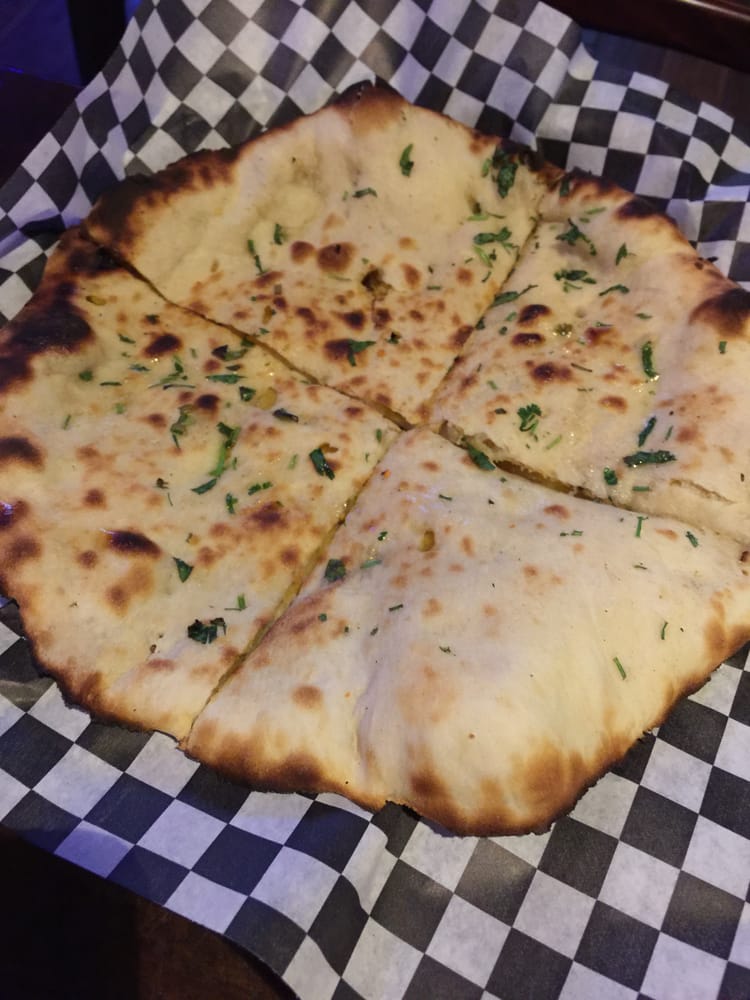 Order Aloo Naan food online from Maharaja Cuisine Of India store, Seattle on bringmethat.com