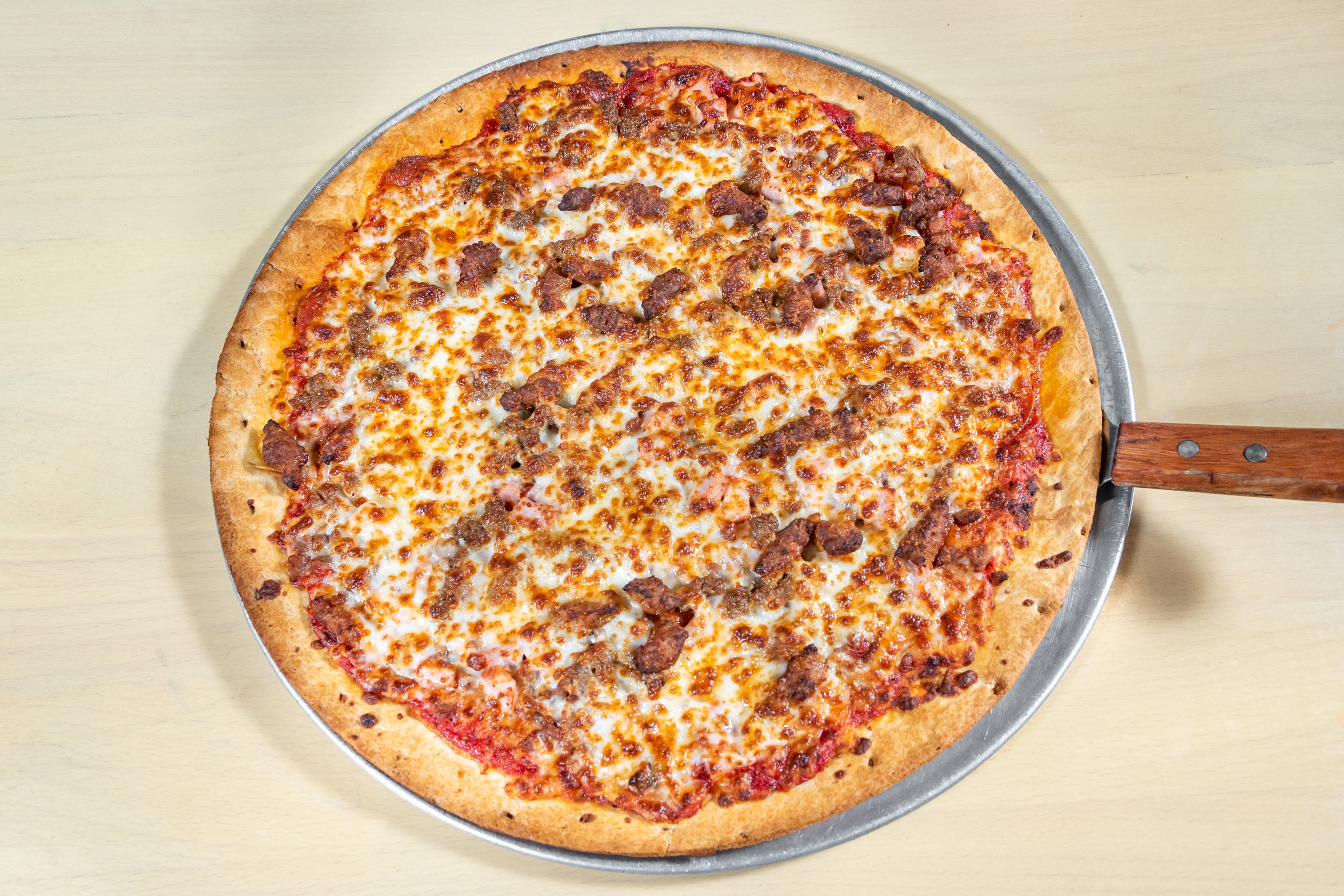 Order Meaty Pizza - 14'' food online from Amadeo's Pizza - Coors Blvd SW store, Albuquerque on bringmethat.com