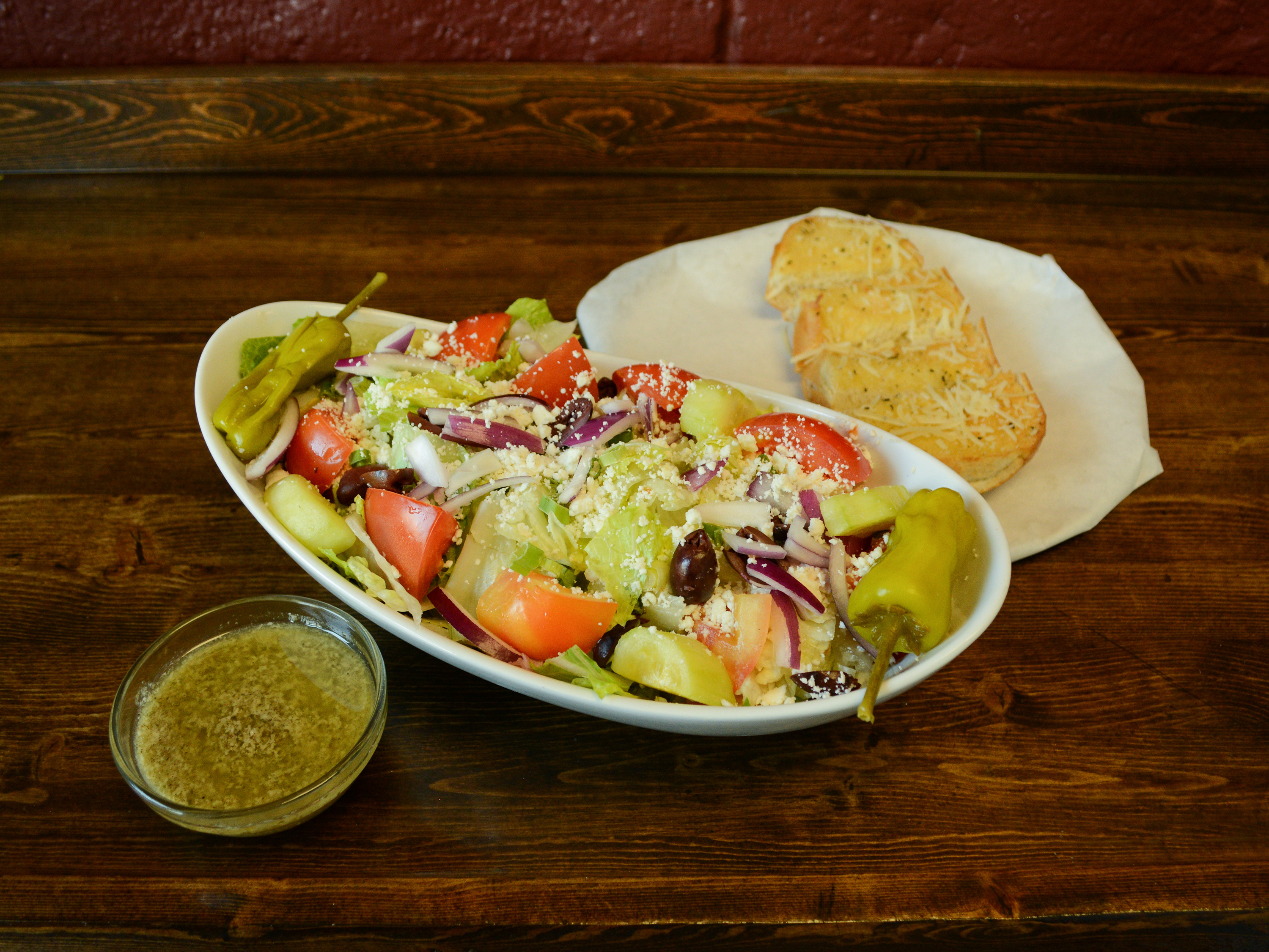 Order Horiatiki Salad food online from Urban Pizza VIP store, Seattle on bringmethat.com