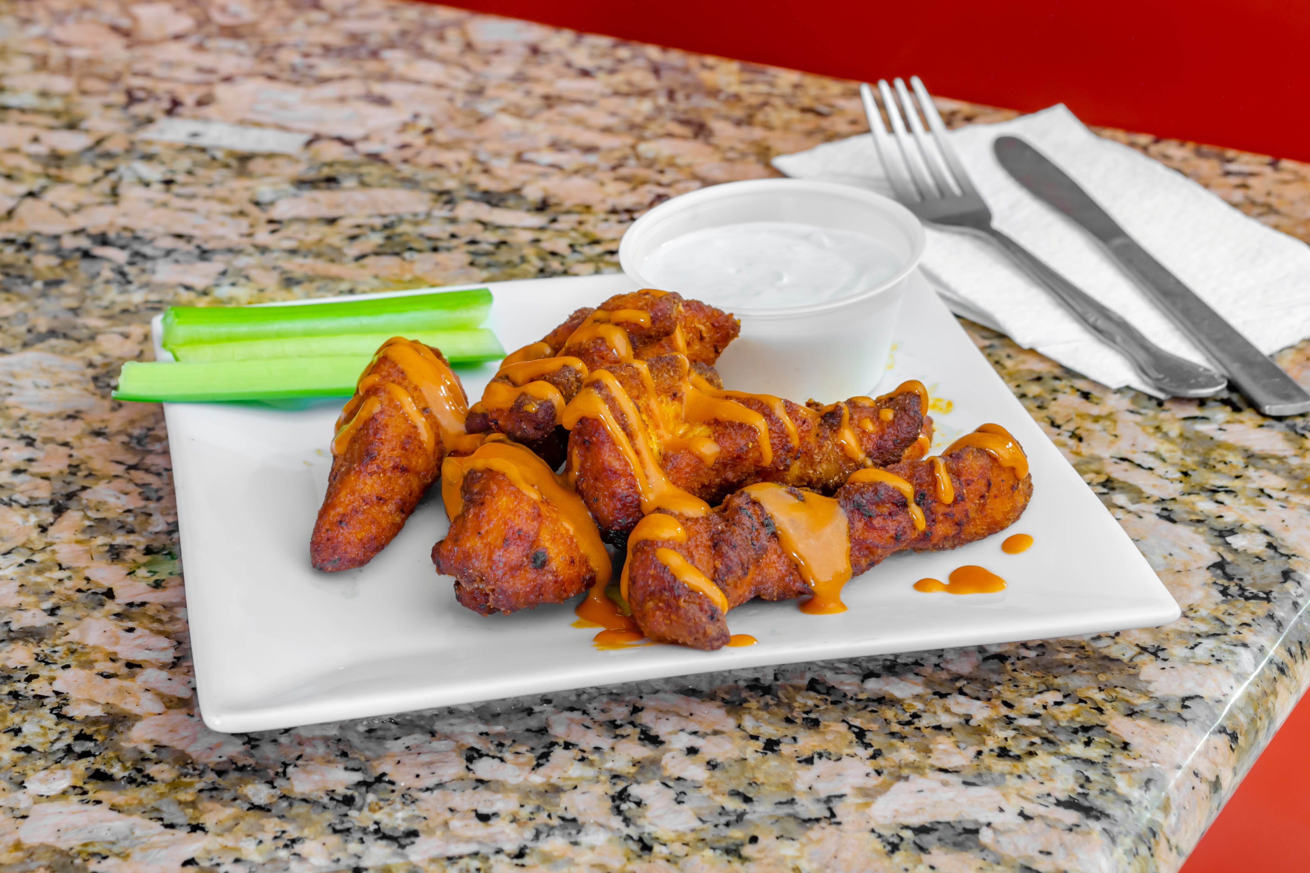 Order Boneless Chicken Wings - 6 Pieces food online from Camila's Pizzeria store, Bensalem on bringmethat.com