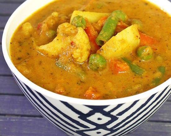 Order Mix Vegetable Curry food online from Mayuri express store, Houston on bringmethat.com