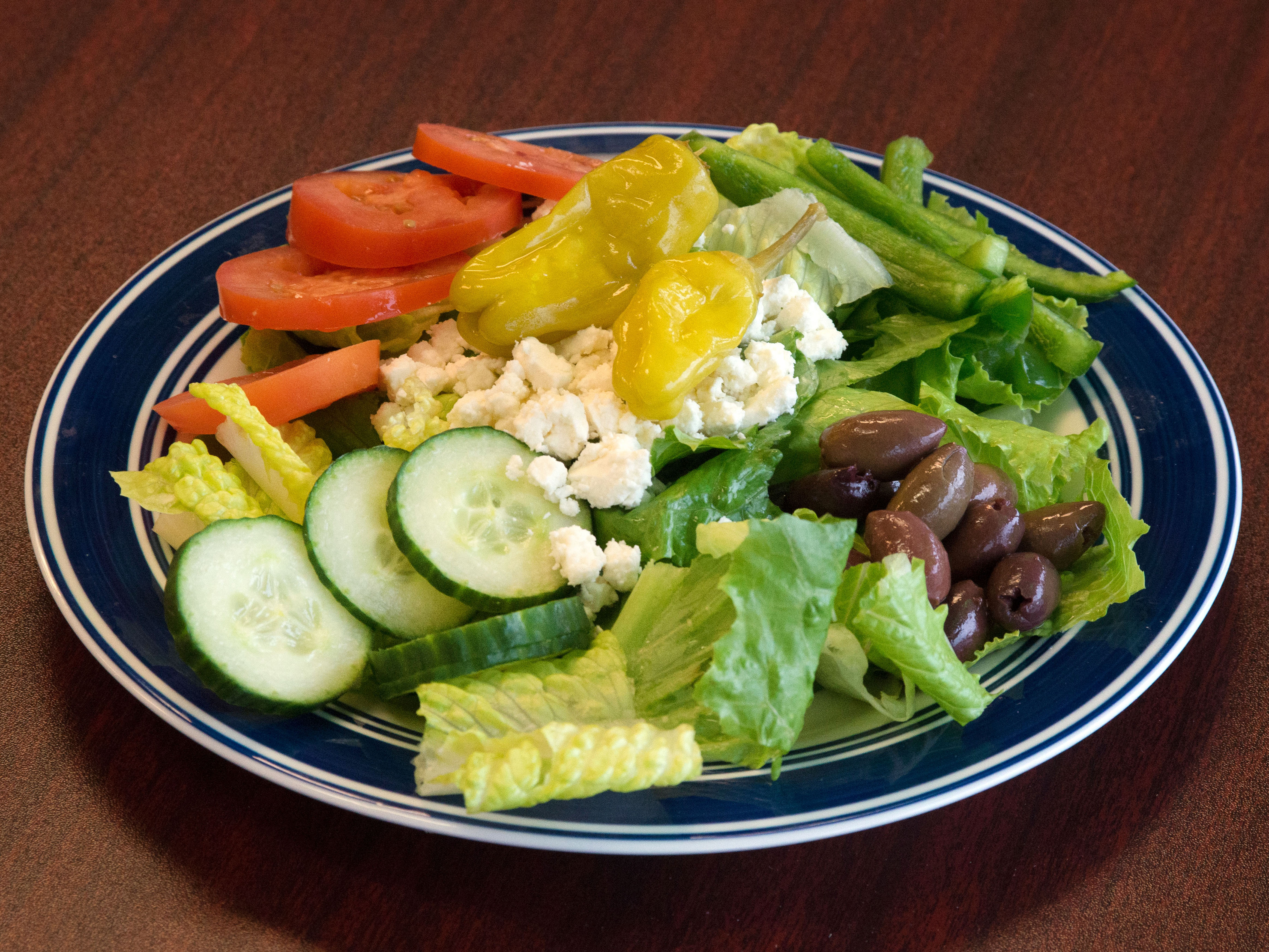 Order Greek Salad food online from Milano Pizza store, Albany on bringmethat.com