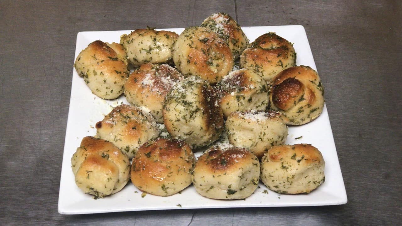 Order Order of Garlic Knots - Appetizer food online from Alfredo Brick Oven Pizza store, Hazle Township on bringmethat.com