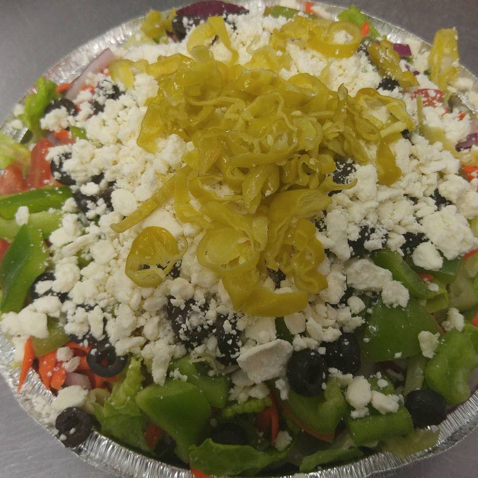 Order Greek Salad - Regular food online from Grandstand Pizza store, El Cajon on bringmethat.com