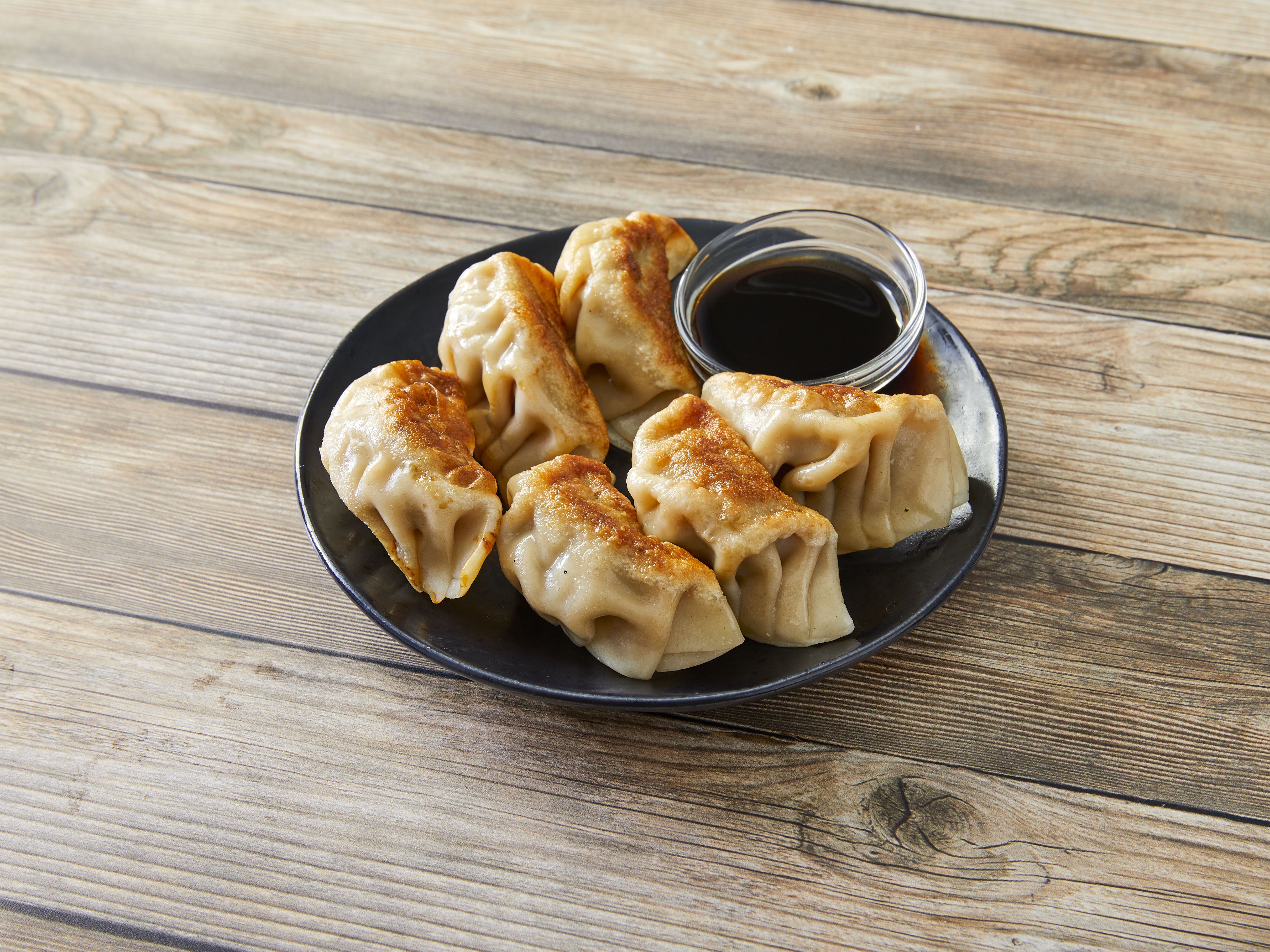 Order 6 Pot Stickers food online from En lai asian grill store, Chicago on bringmethat.com
