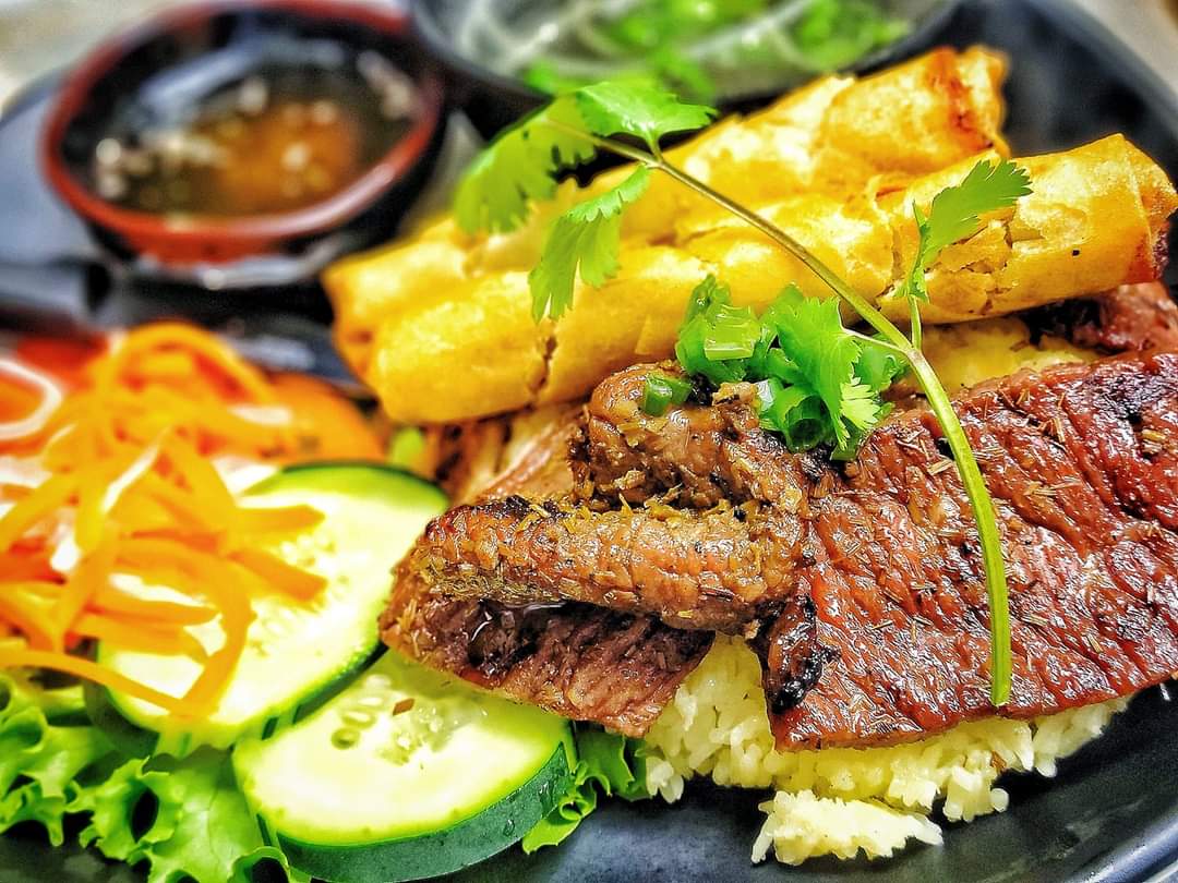 Order 22. Charbroiled Beef with Eggrolls Rice  food online from Pho And More store, Friendswood on bringmethat.com
