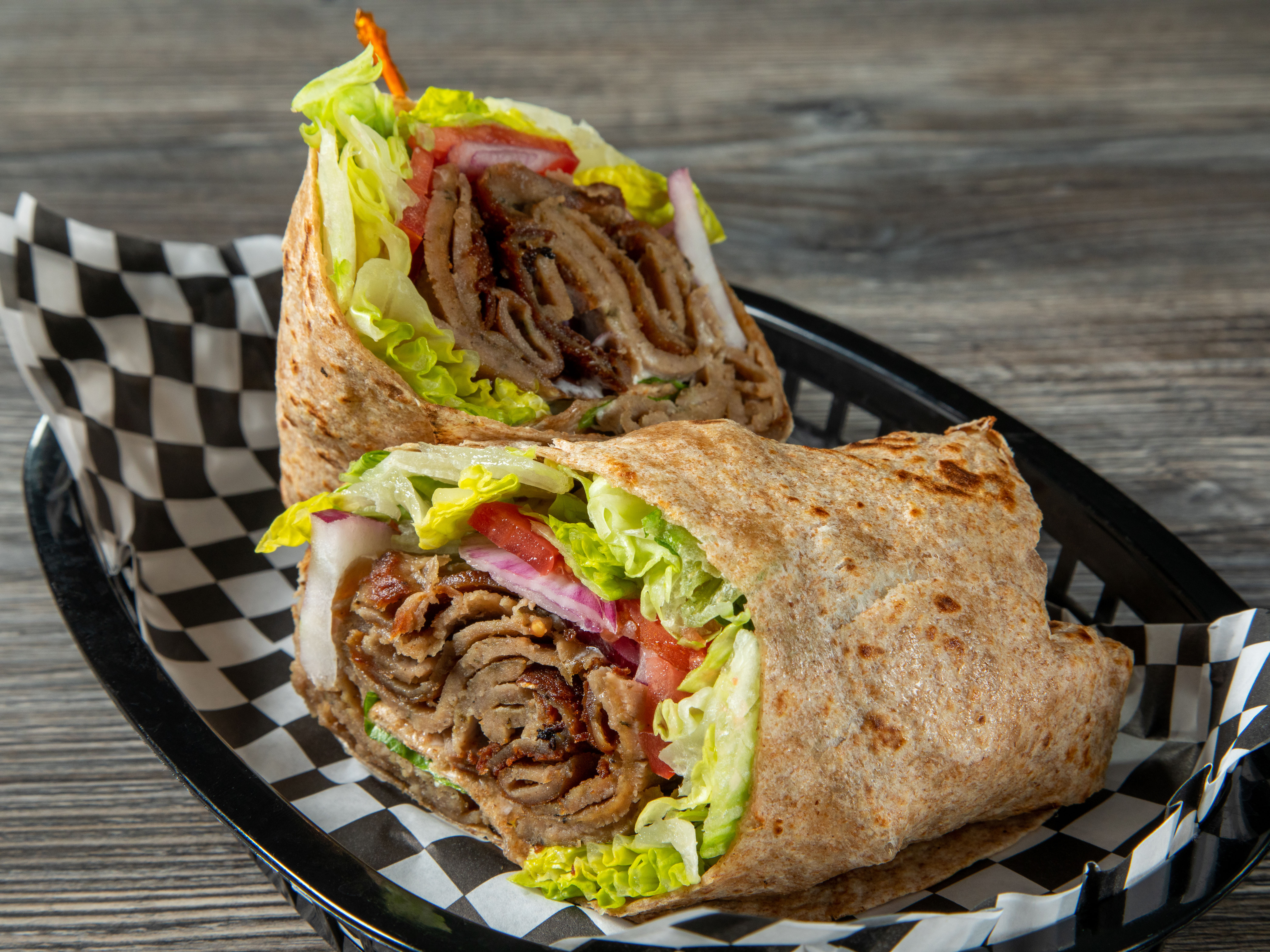 Order Beef & Lamb Gyro wrap - Specify pita or tortilla food online from Kabob Cafe store, Foothill Ranch on bringmethat.com