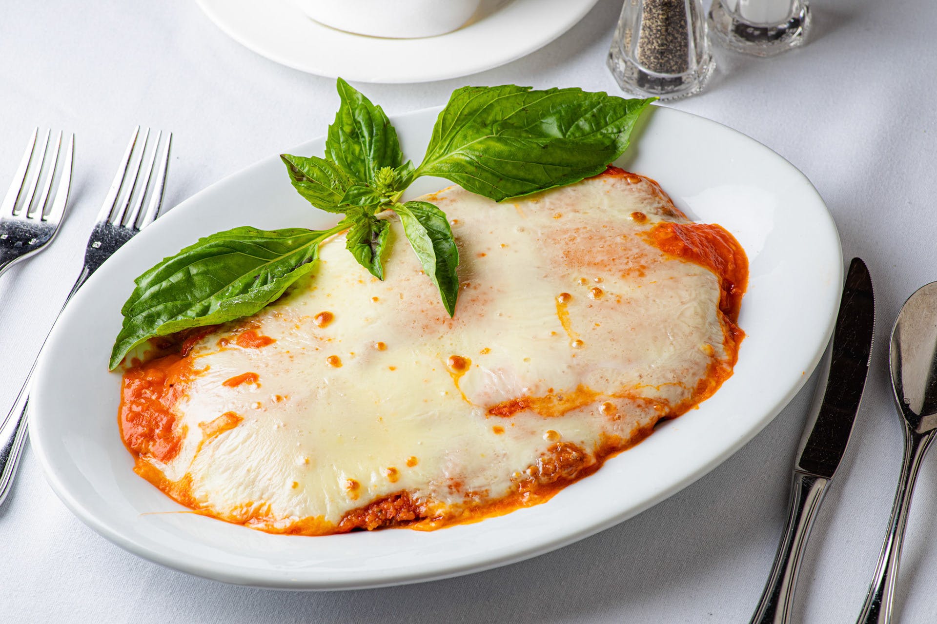 Order Chicken Parmigiana - Entrees food online from Chazz Palminteri Italian Restaurant store, White Plains on bringmethat.com