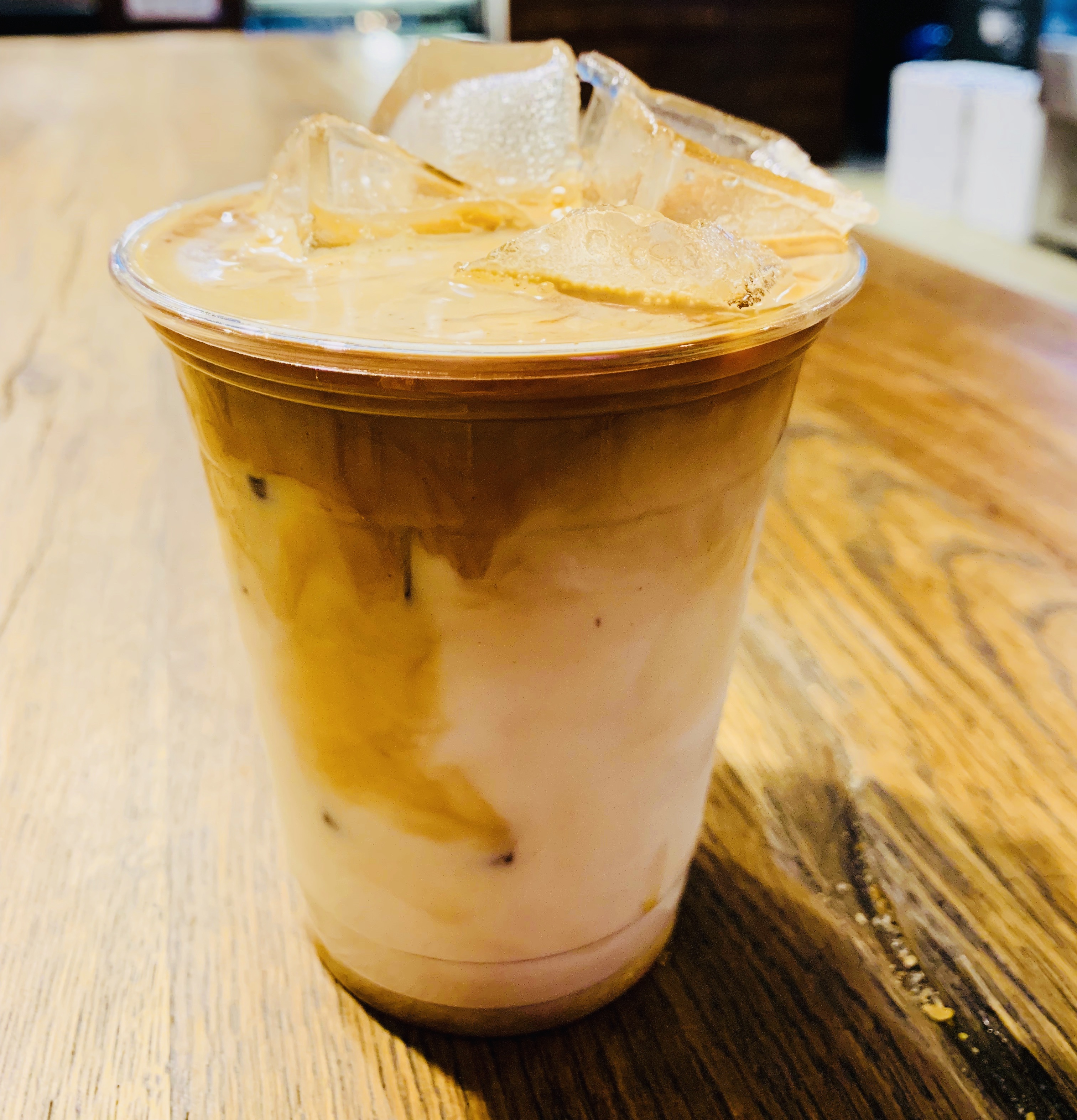 Order Ice latte food online from Madman Espresso store, New York on bringmethat.com