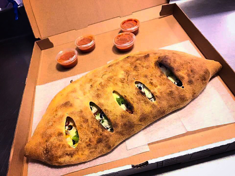 Order Calzone food online from Gaya Pizzeria store, Somerville on bringmethat.com