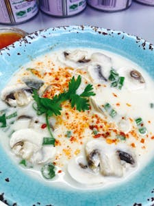 Order Tom Kar Gai Soup food online from Asian Thai Kitchen store, Miami on bringmethat.com