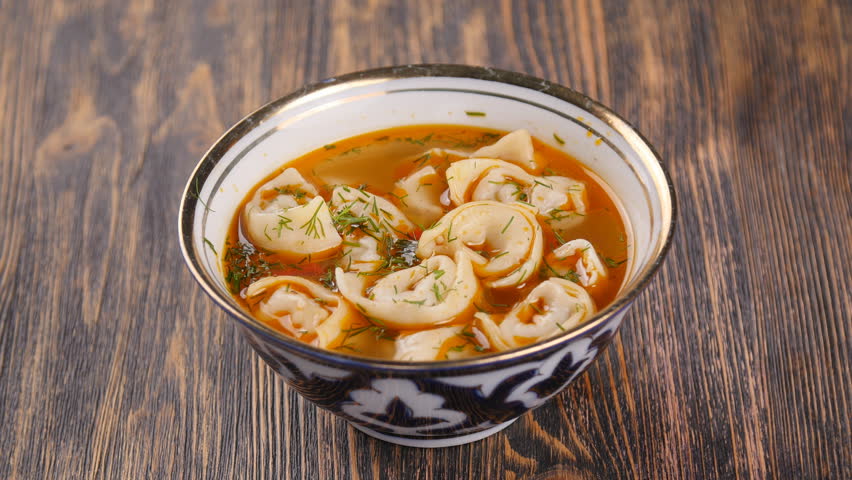 Order Dumpling Soup food online from Suzani Restaurant store, Philadelphia on bringmethat.com