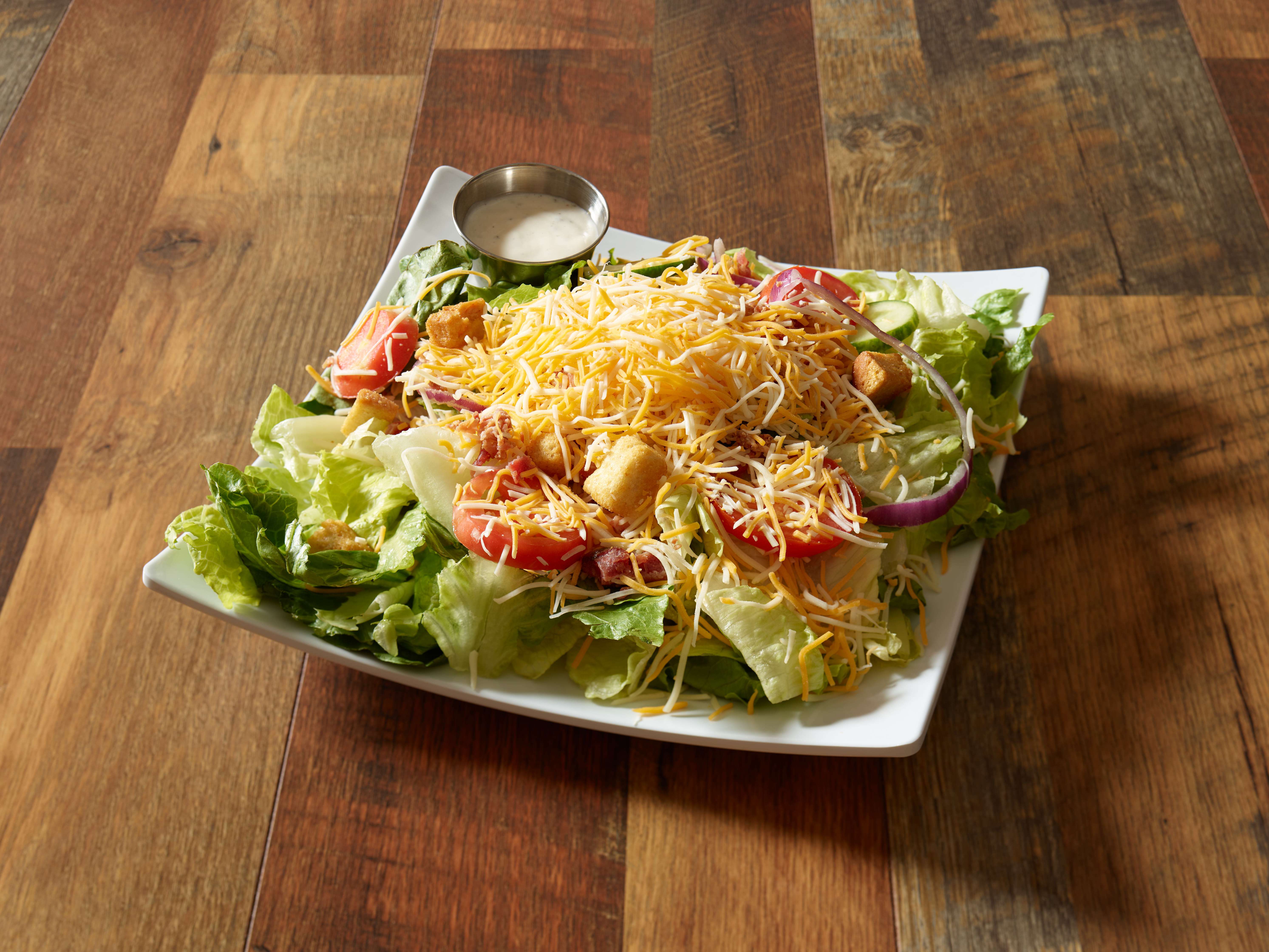 Order Big Salad food online from Outlaw Potato Shack by Texas BBQ Joint  store, Rochester on bringmethat.com
