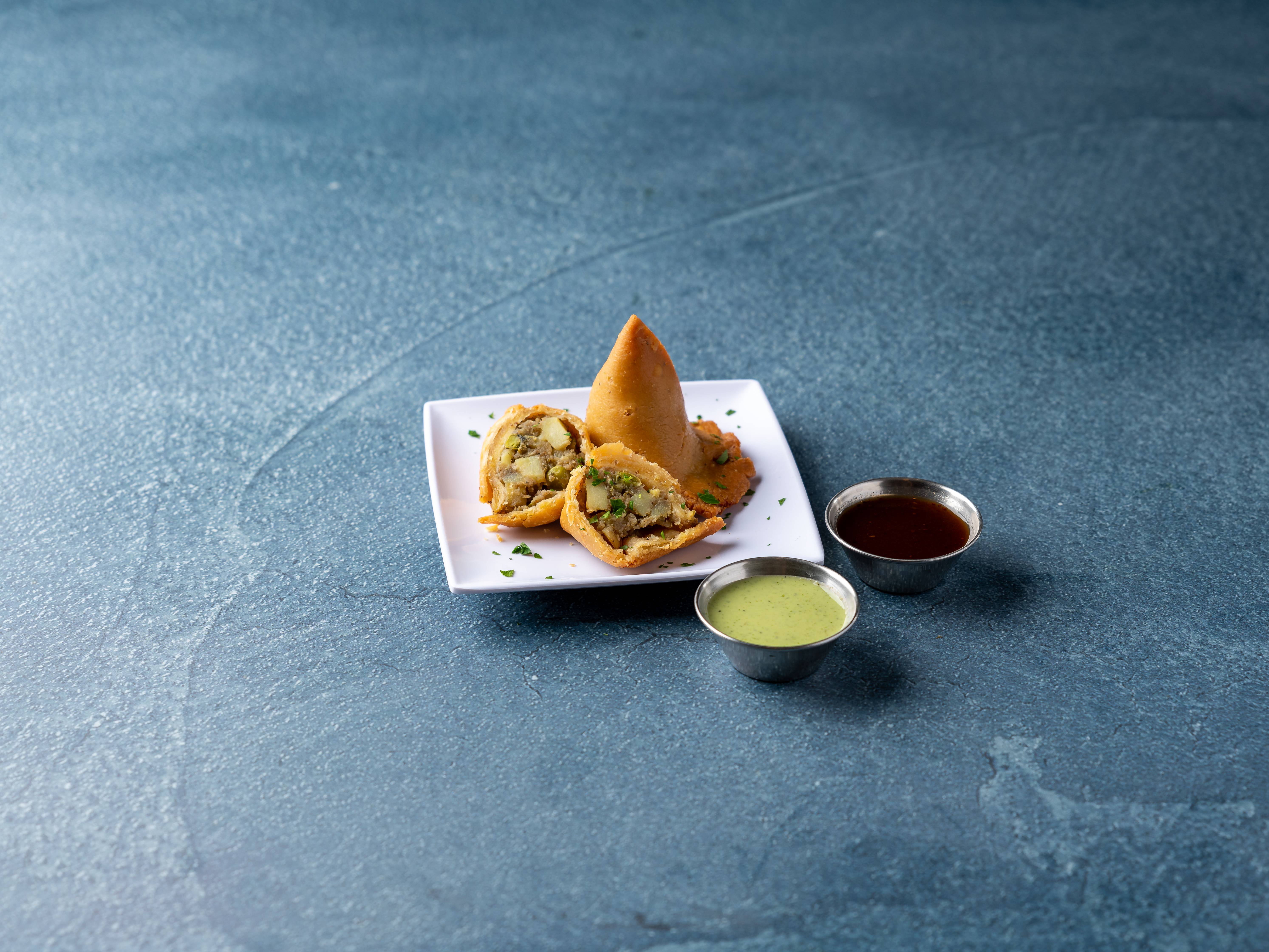 Order 2 Piece Vegetable Samosa food online from Siri Indian Restaurant store, Chicago on bringmethat.com