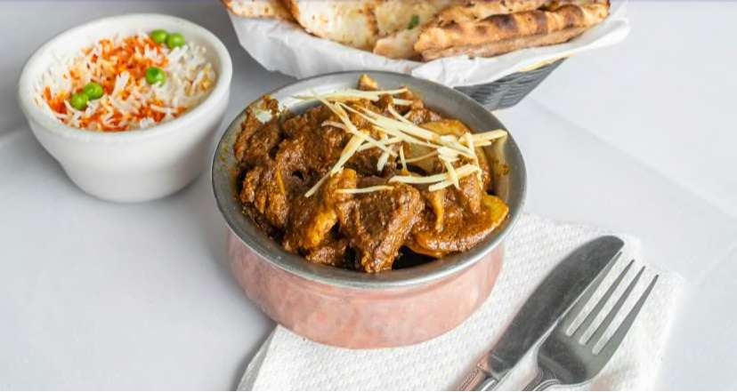Order Goat Fry food online from Minerva Indian Cuisine store, Gaithersburg on bringmethat.com