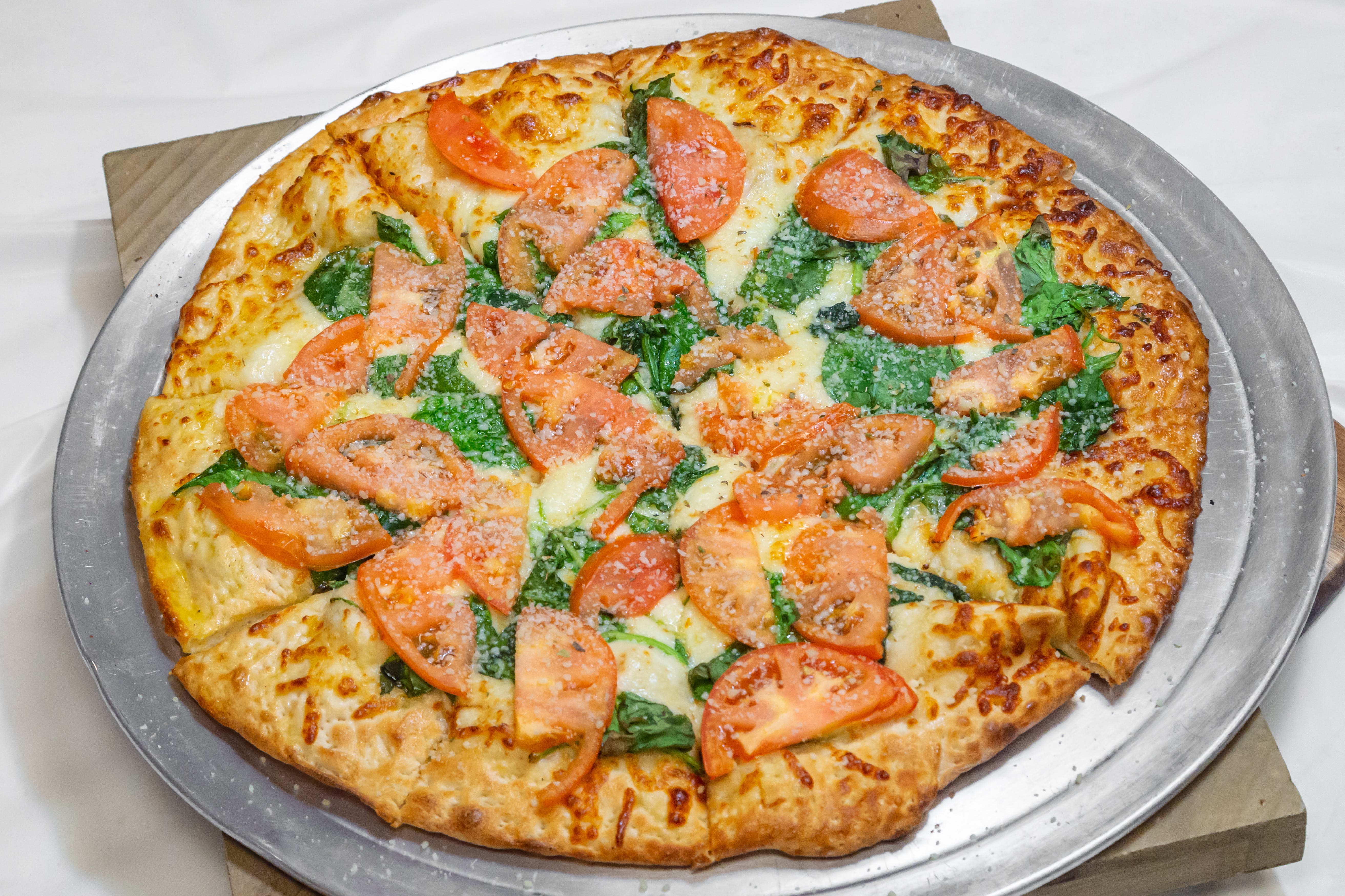 Order Garlic Spinach White - Large 14''  (8 Cuts) food online from Grandslam Pizza store, Plum on bringmethat.com