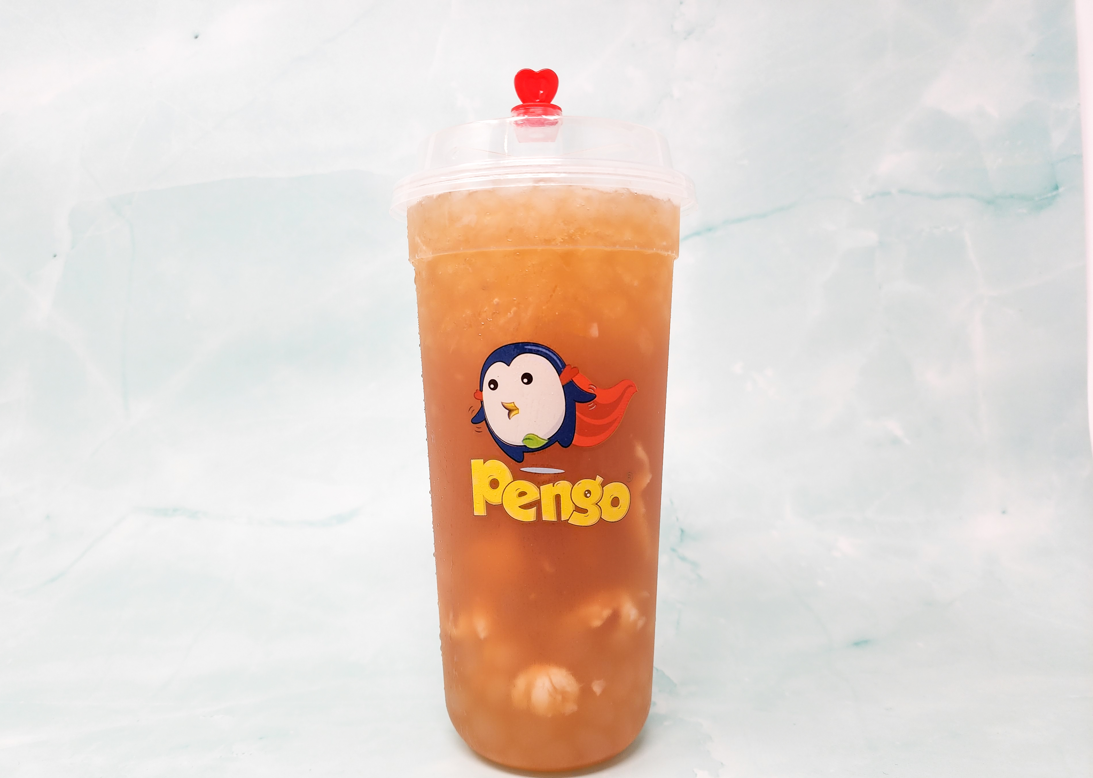 Order Lychee Peach Tea food online from Pengo Drink Station store, Lake Forest on bringmethat.com