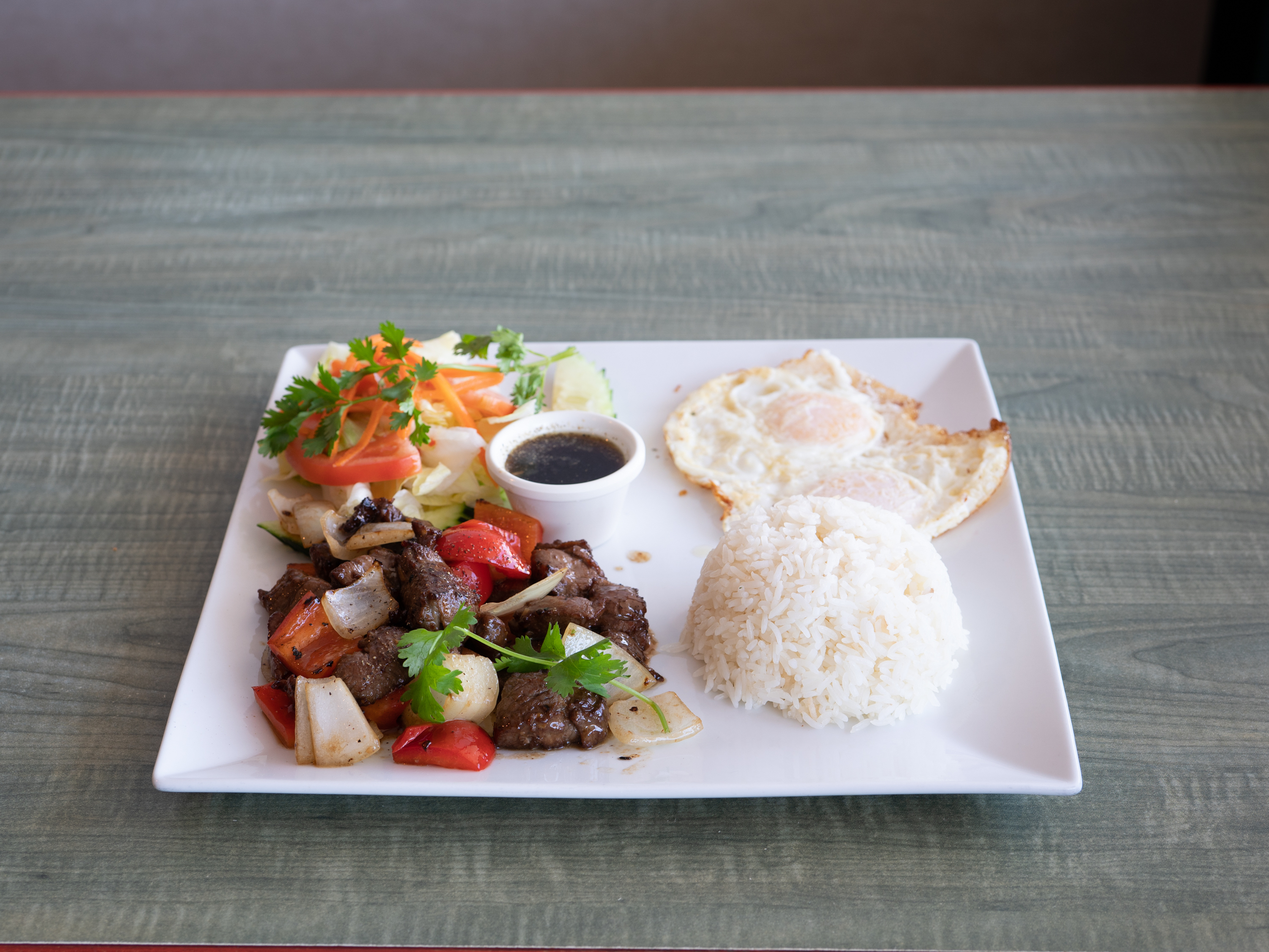 Order Shaken Beef / Bo Luc Lac food online from Happy Pho store, Costa Mesa on bringmethat.com