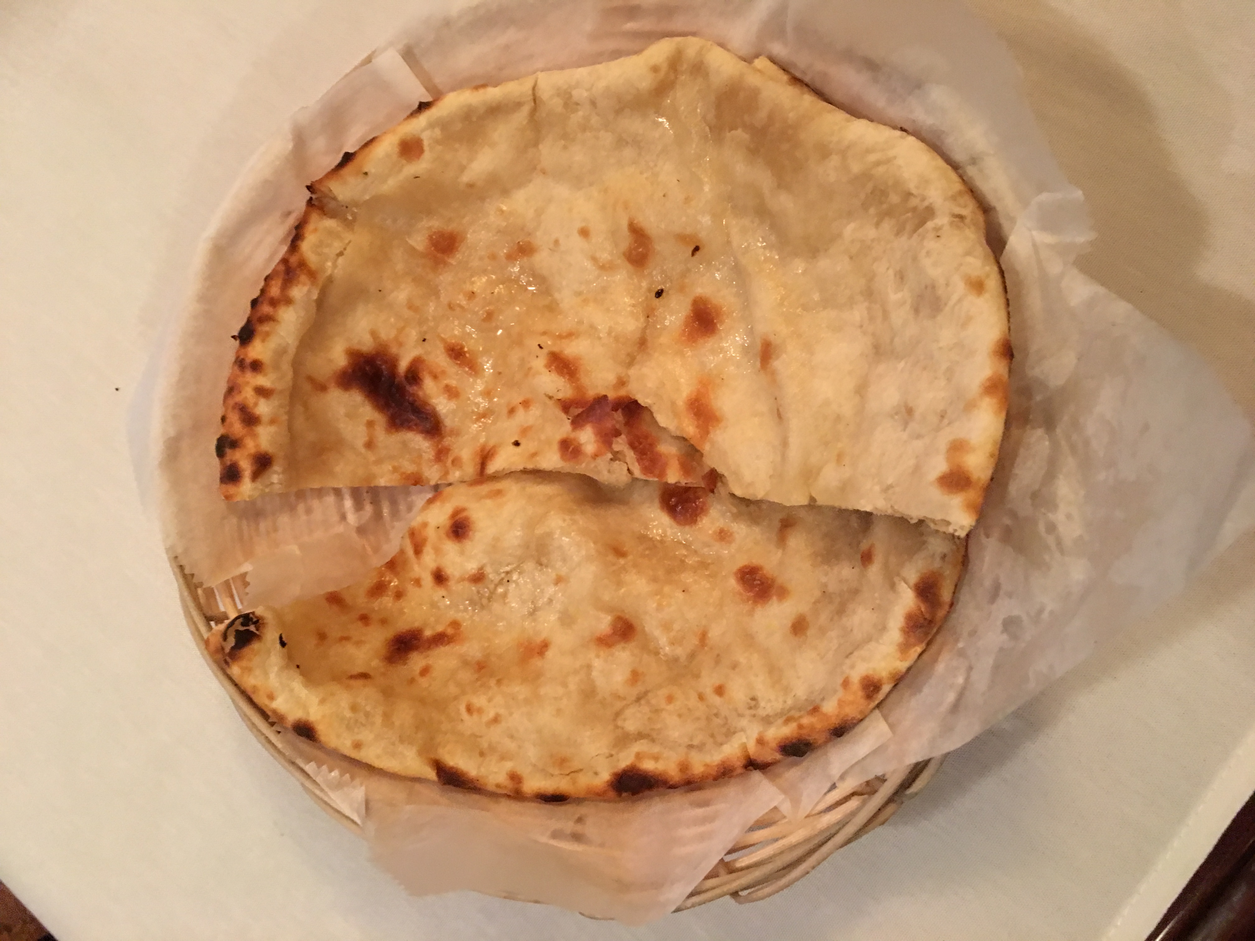 Order Naan food online from Flavors of India store, Washington on bringmethat.com