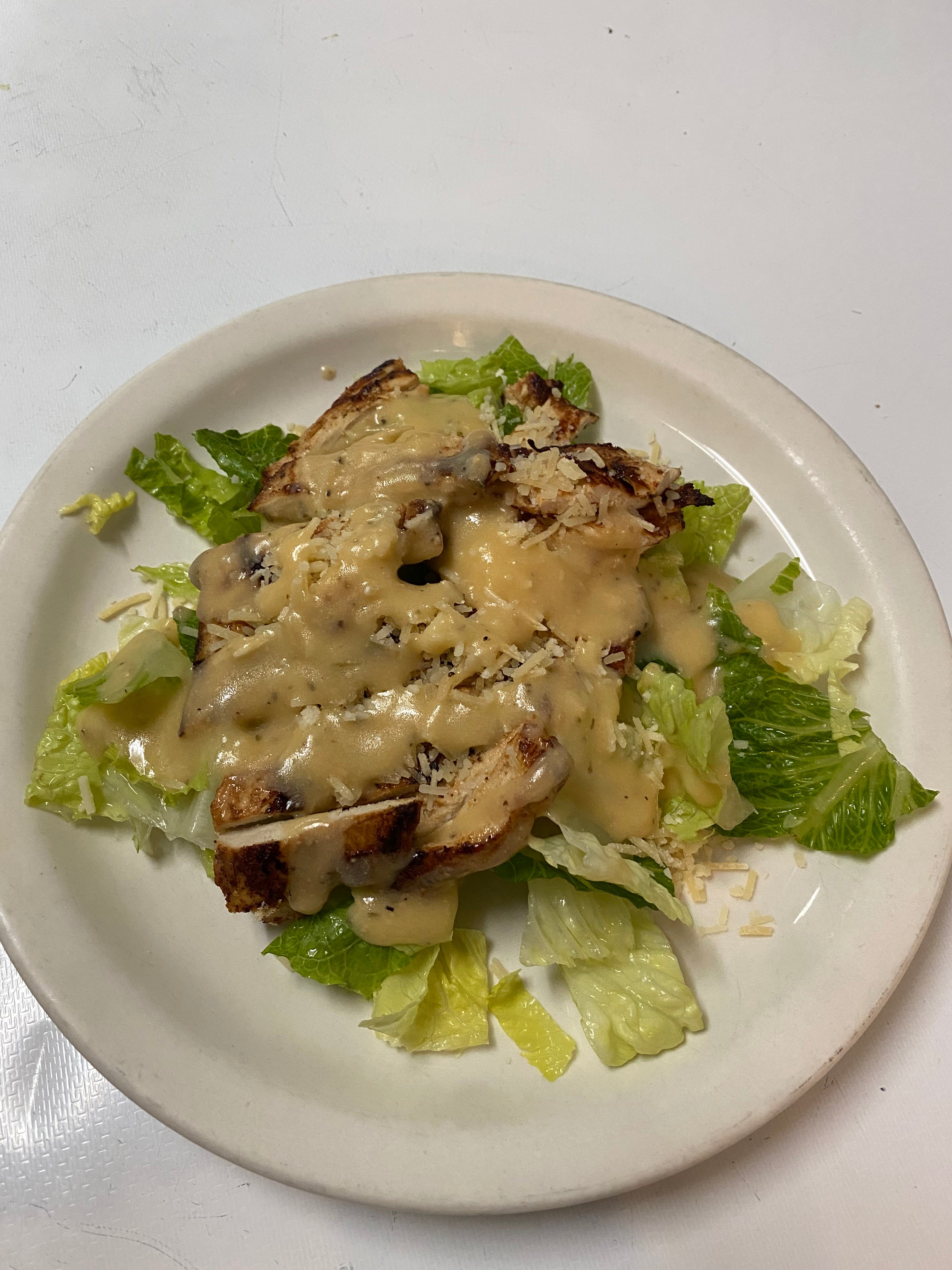Order Grilled Chicken Caesar Salad - Small food online from Michelangelo's Pizza store, East Brunswick on bringmethat.com