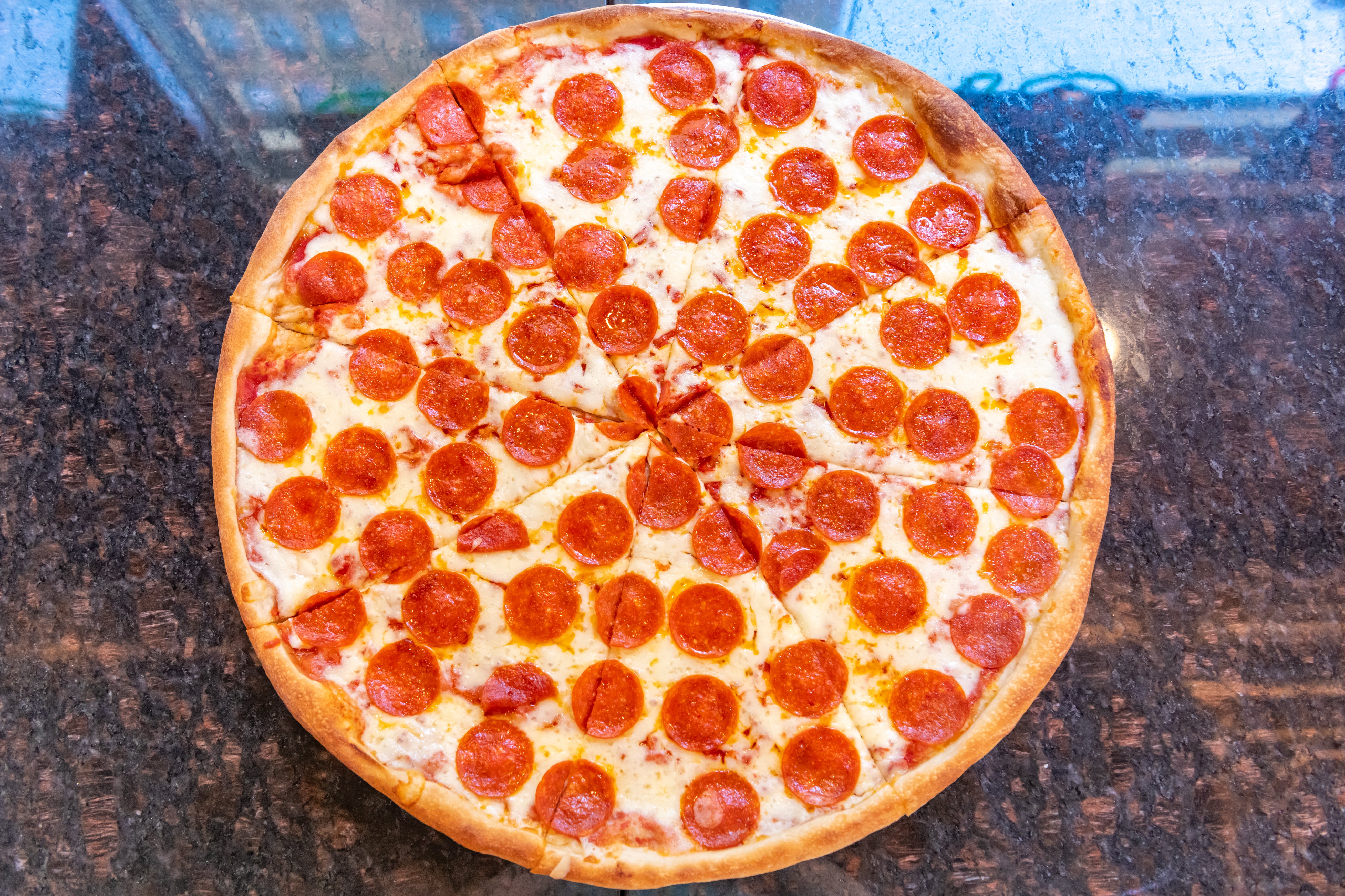 Order One Topping Pizza Slice - Slice food online from Bravo Pizza store, New York on bringmethat.com