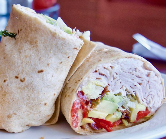 Order Turkey Avocado Wrap food online from Tops American Grill, Bakery, & Bar store, Schenectady on bringmethat.com