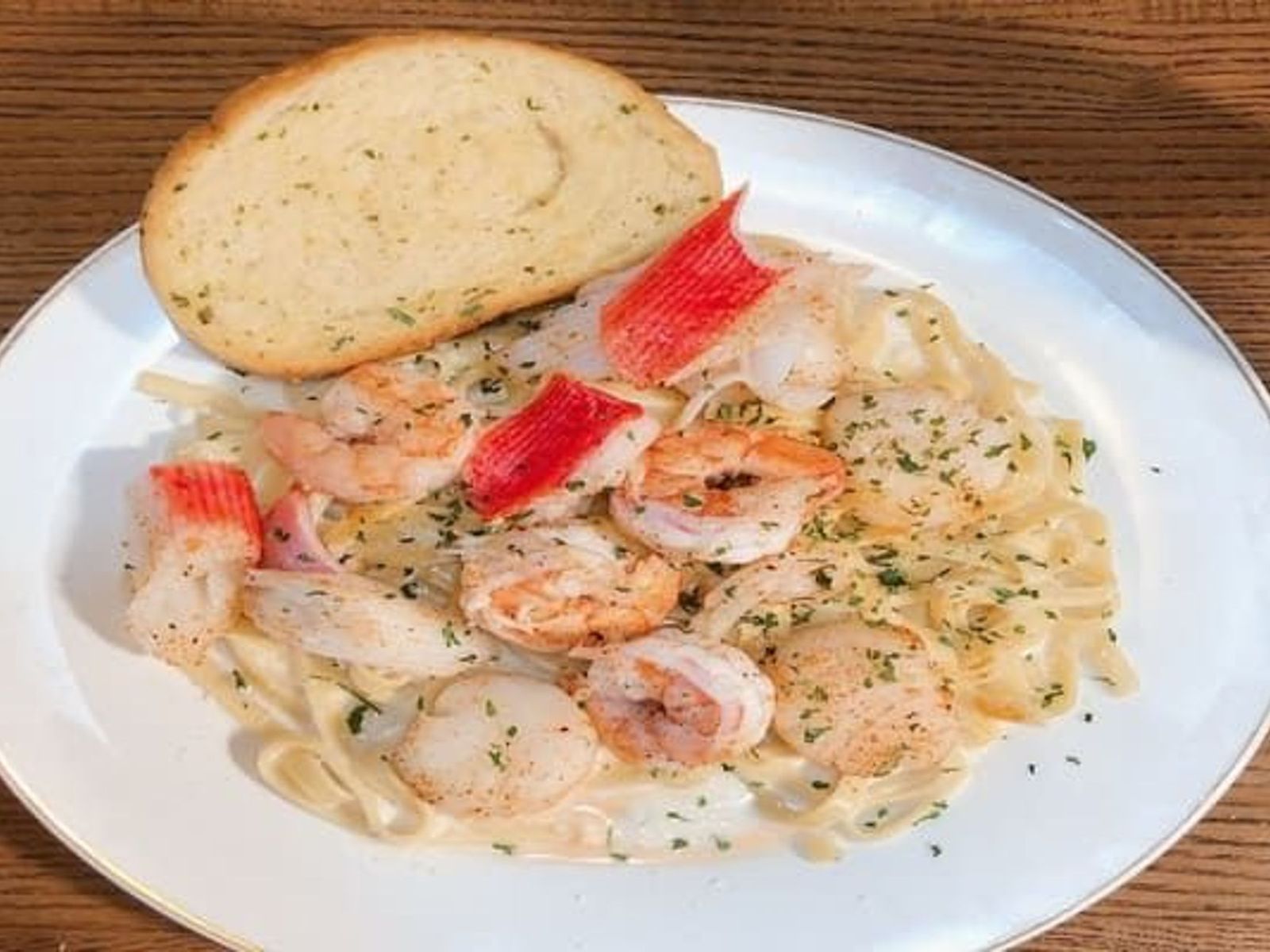 Order Seafood Pasta food online from Juicy Seafood store, Clarksville on bringmethat.com