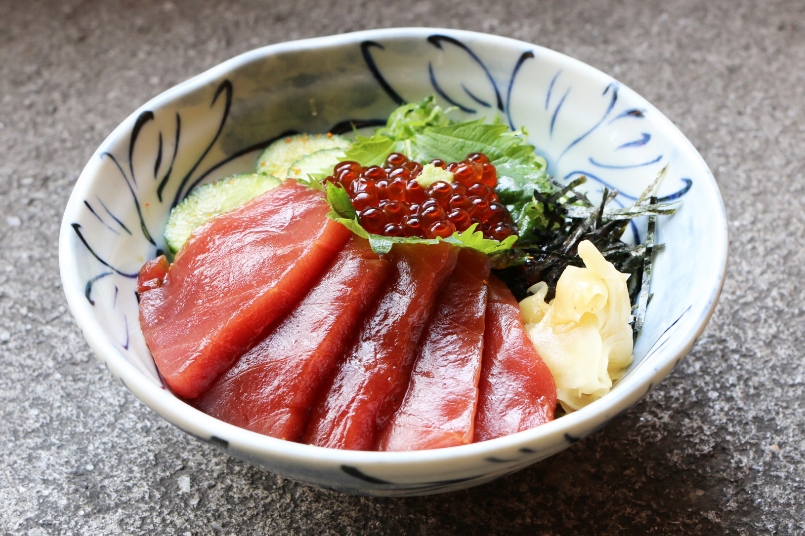 Order Tuna Ikura Chirashi food online from Chikarashi store, New York on bringmethat.com