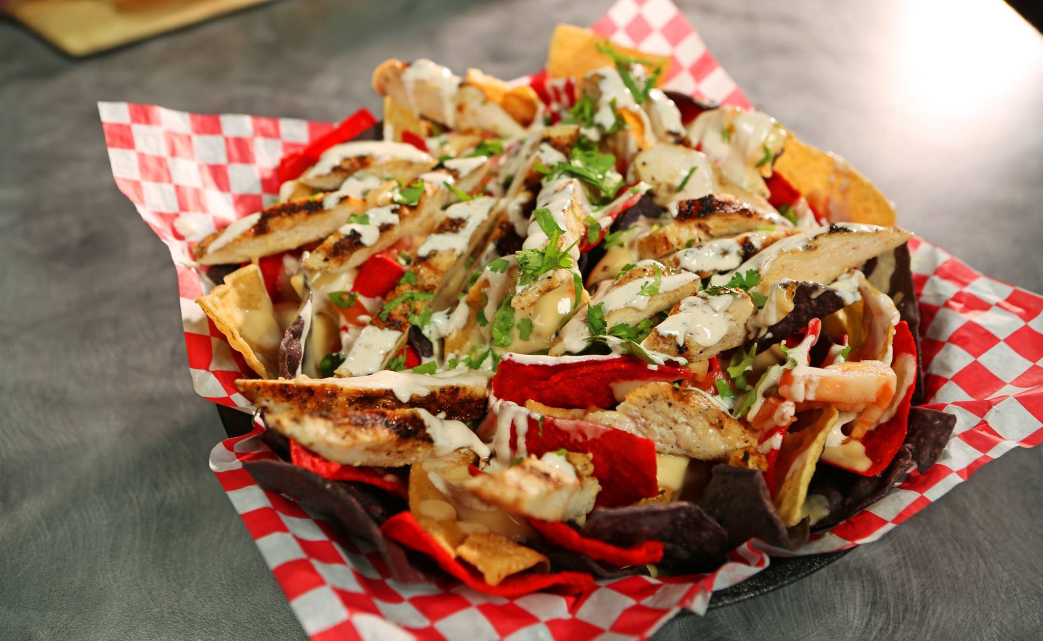 Order Large Fully Loaded Nachos with chicken  food online from Jungle Jaks store, El Paso on bringmethat.com