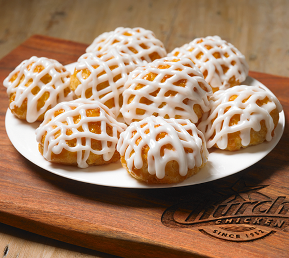 Order 8 Frosted Honey-Butter Biscuits™ food online from Church Chicken store, El Centro on bringmethat.com