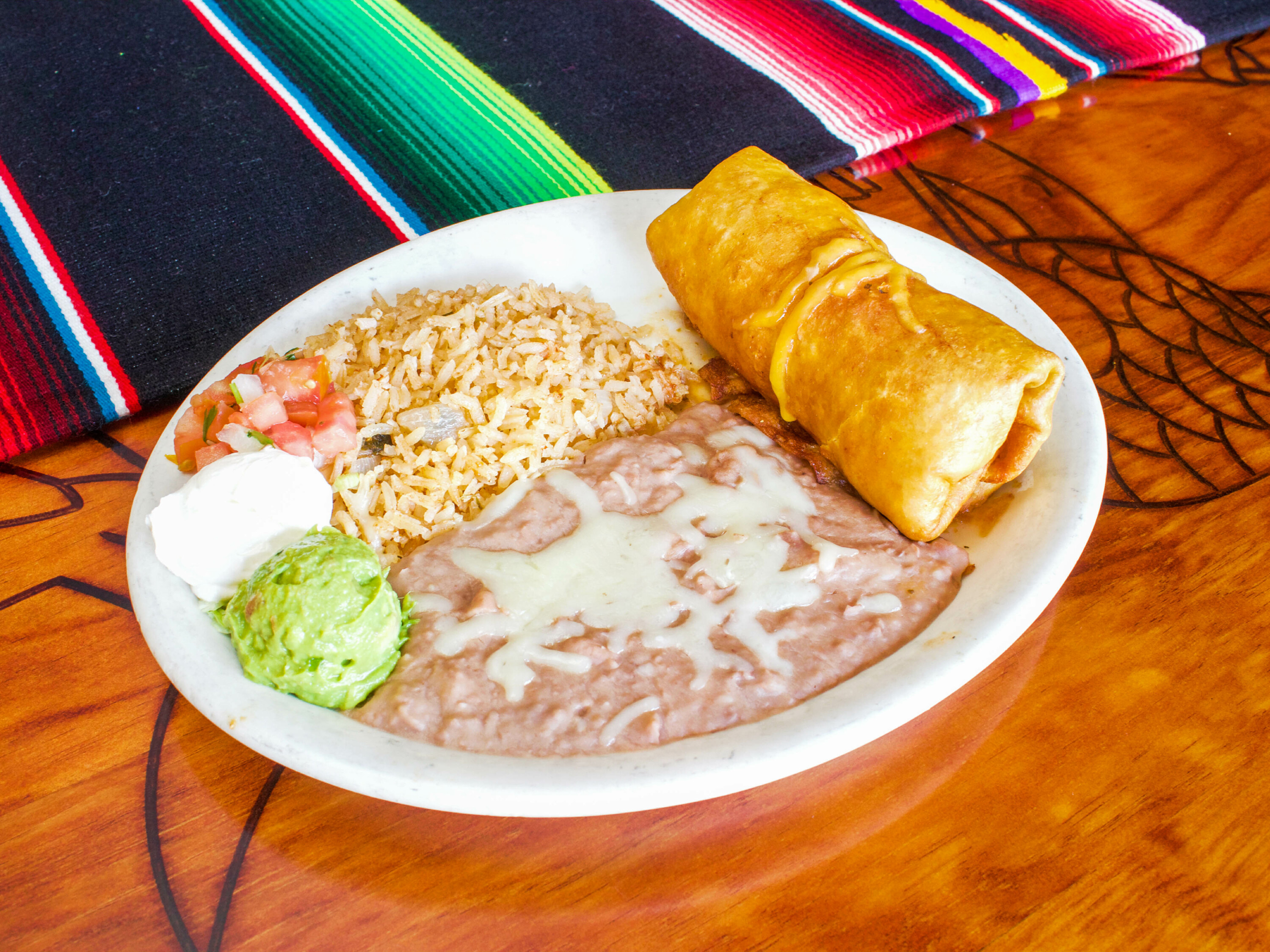 Order 8. Chimichanga Combo 1 food online from La Fuente Mexican Restauant store, Brentwood on bringmethat.com