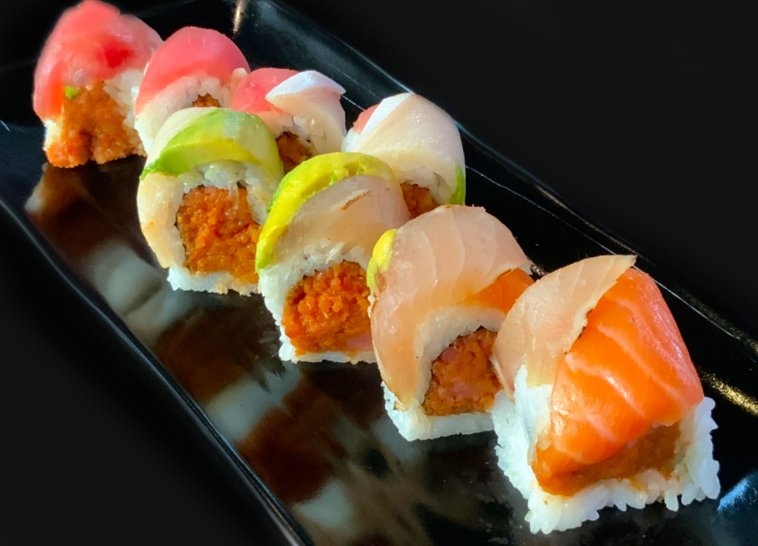 Order Spicy Rainbow Roll food online from Sushi Damu store, Tustin on bringmethat.com