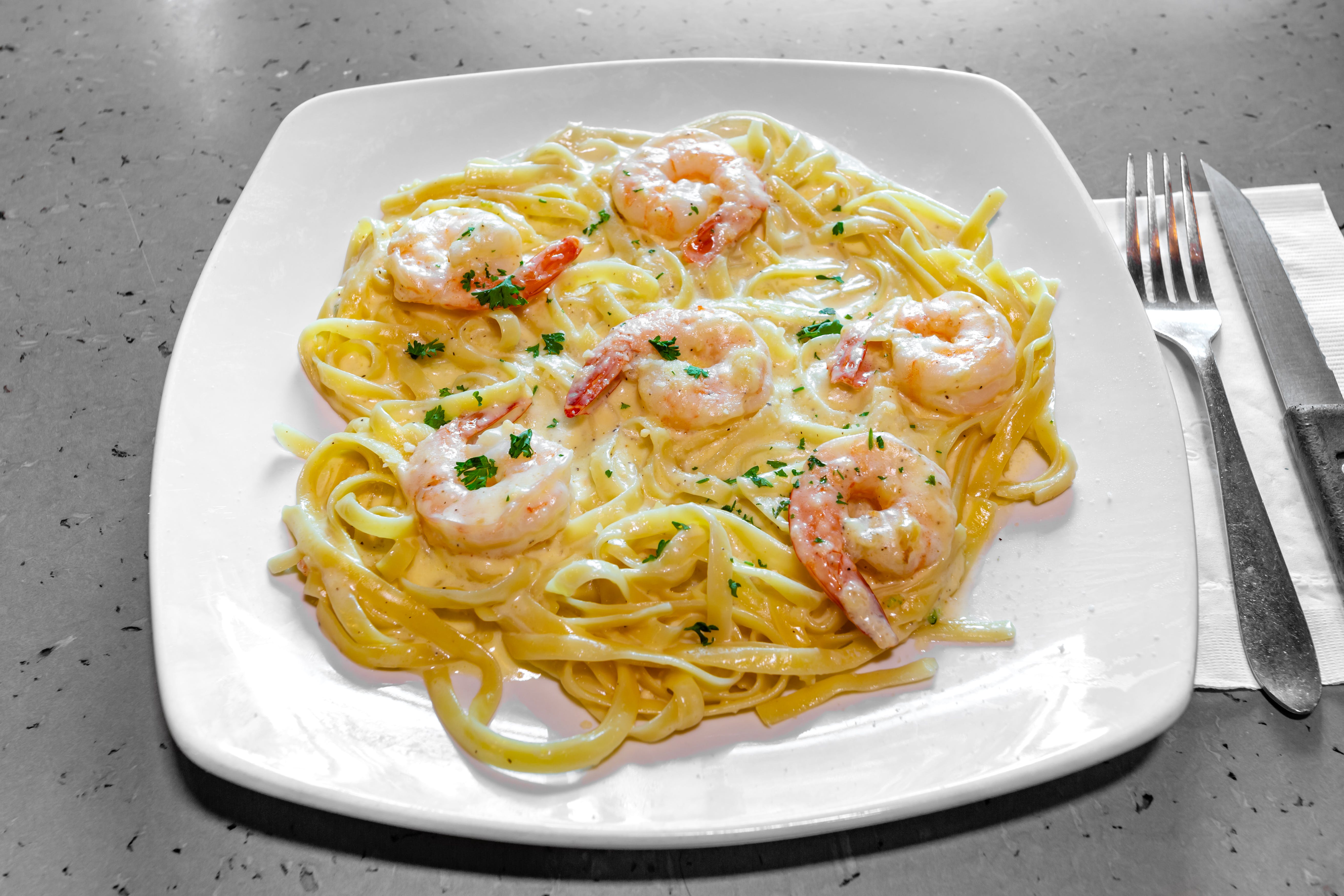 Order Shrimp Alfredo - Entree food online from Nino Italian Restaurant store, Reading on bringmethat.com