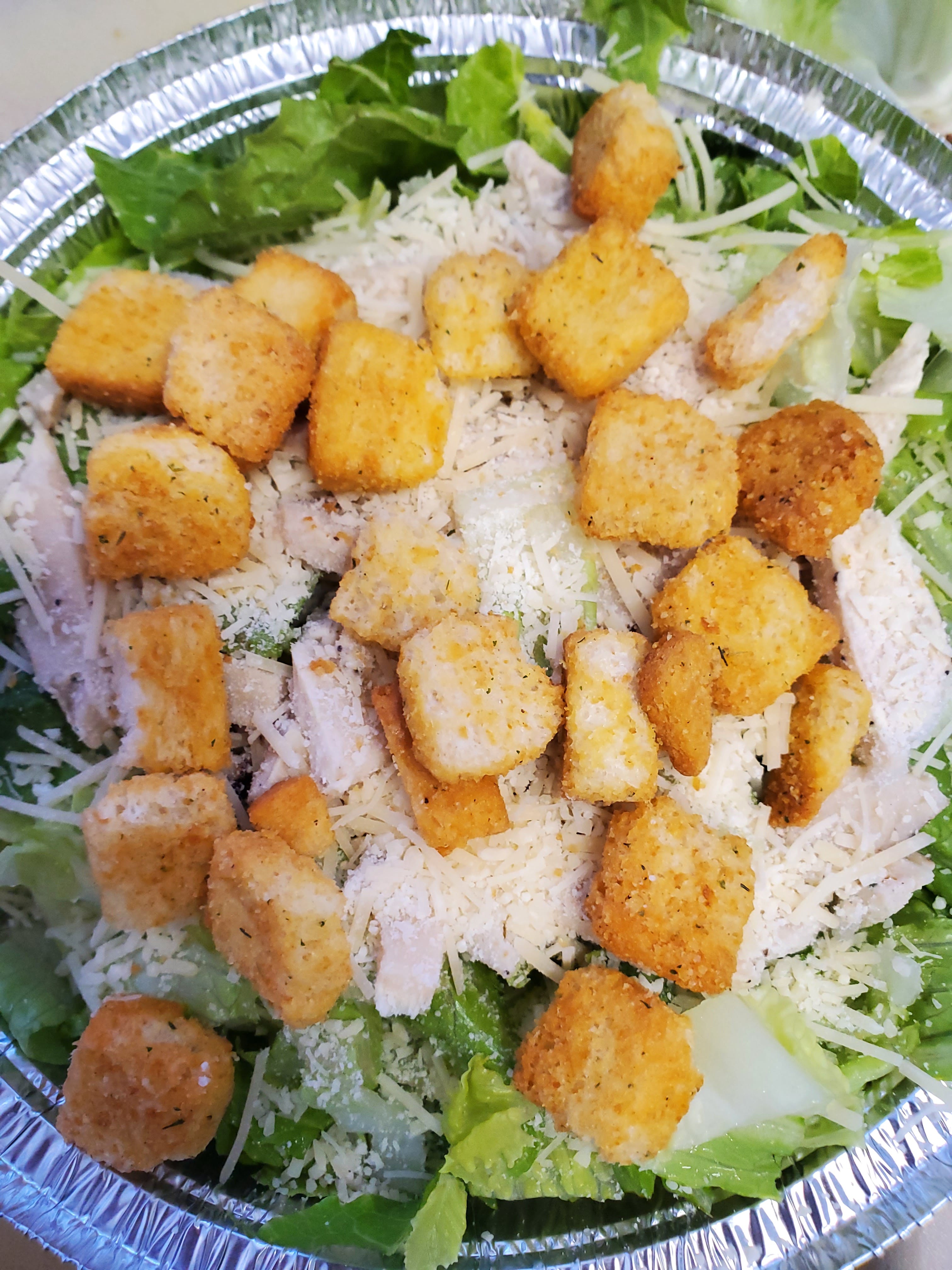 Order Caesar Salad - Salad food online from Catalano's Pizza store, Long Beach on bringmethat.com