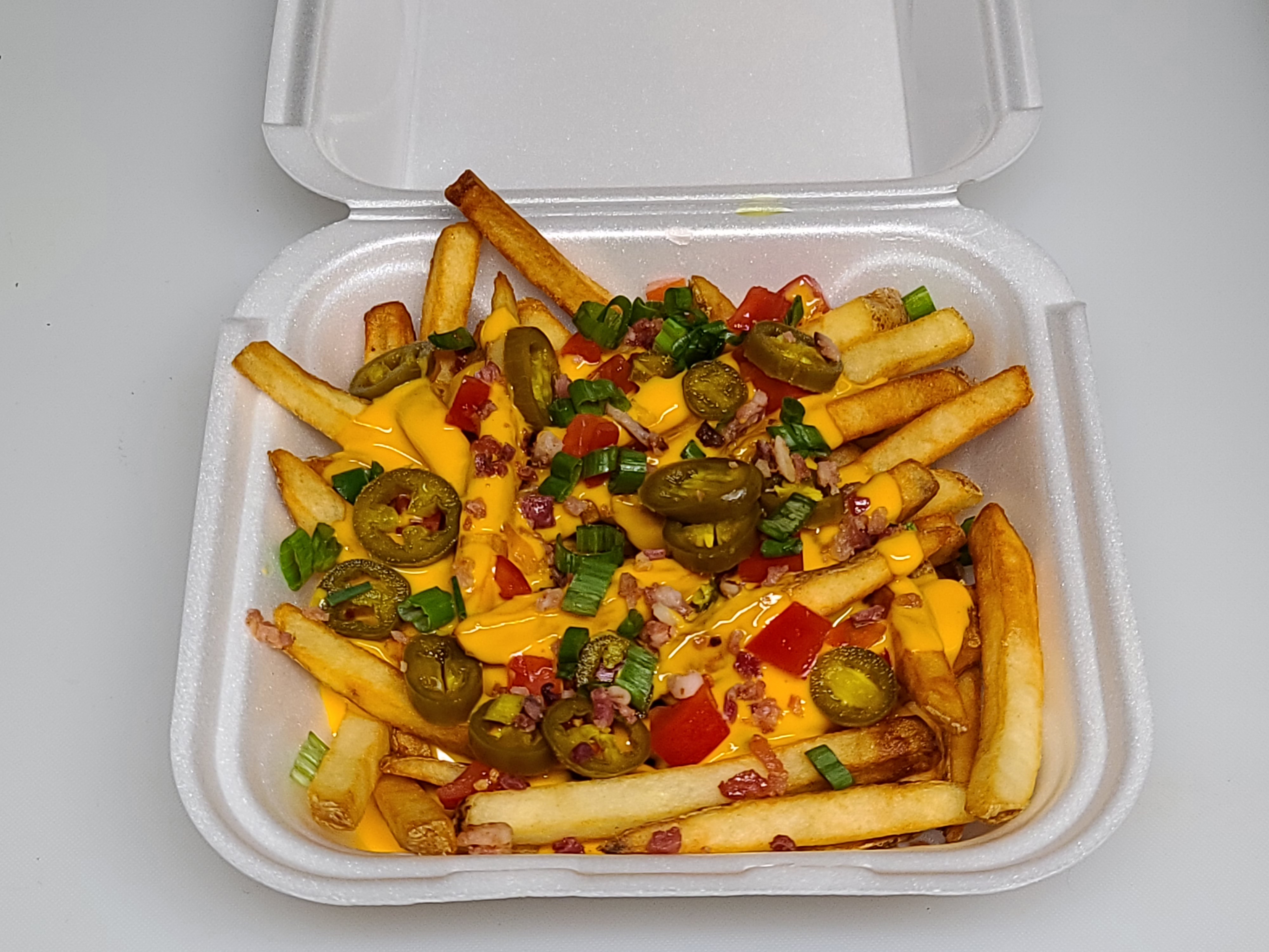 Order Jackpot (Loaded Fries) food online from Real Deal Grill store, Delaware on bringmethat.com