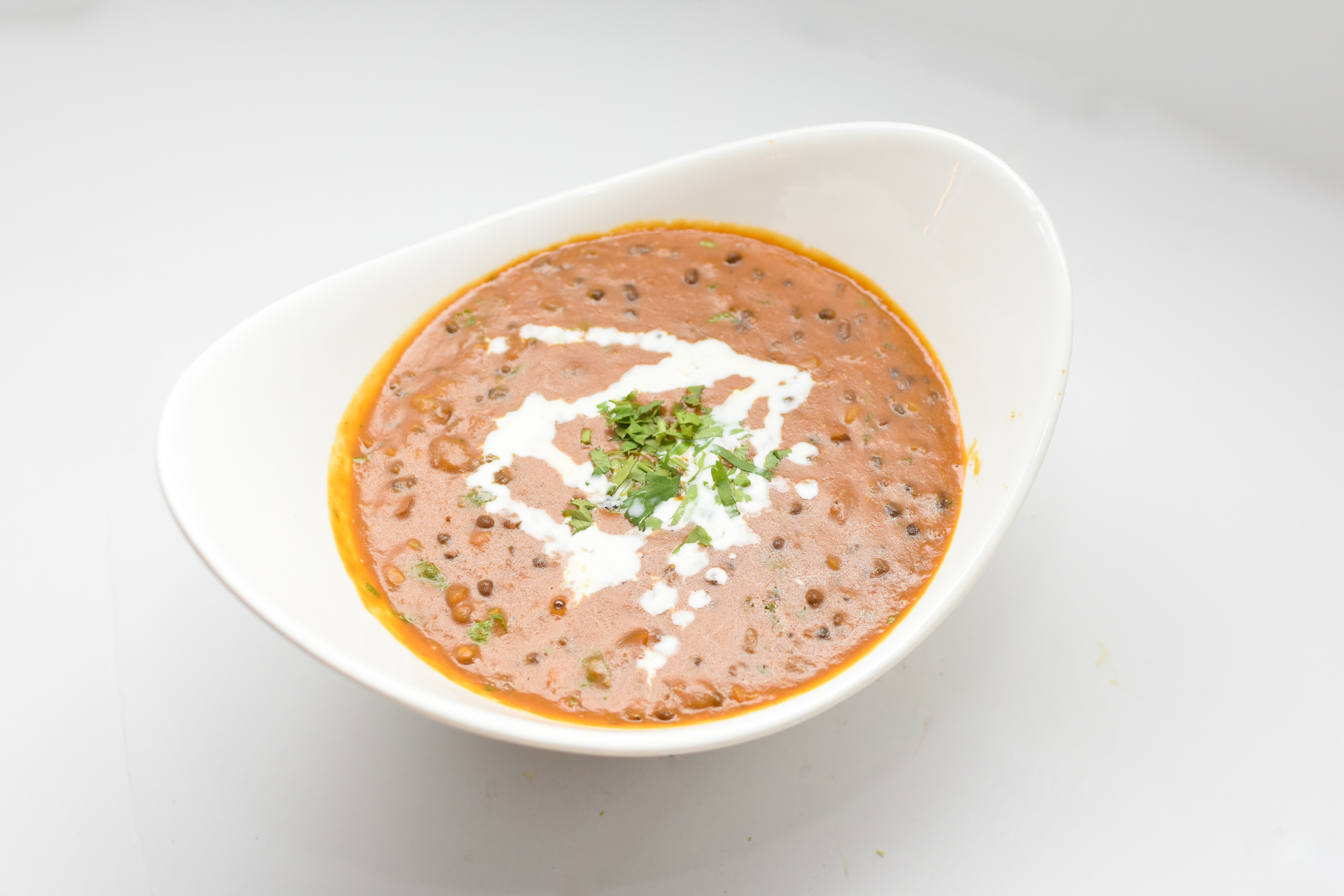 Order Daal Makhni food online from Sher-A-Punjab store, Quincy on bringmethat.com