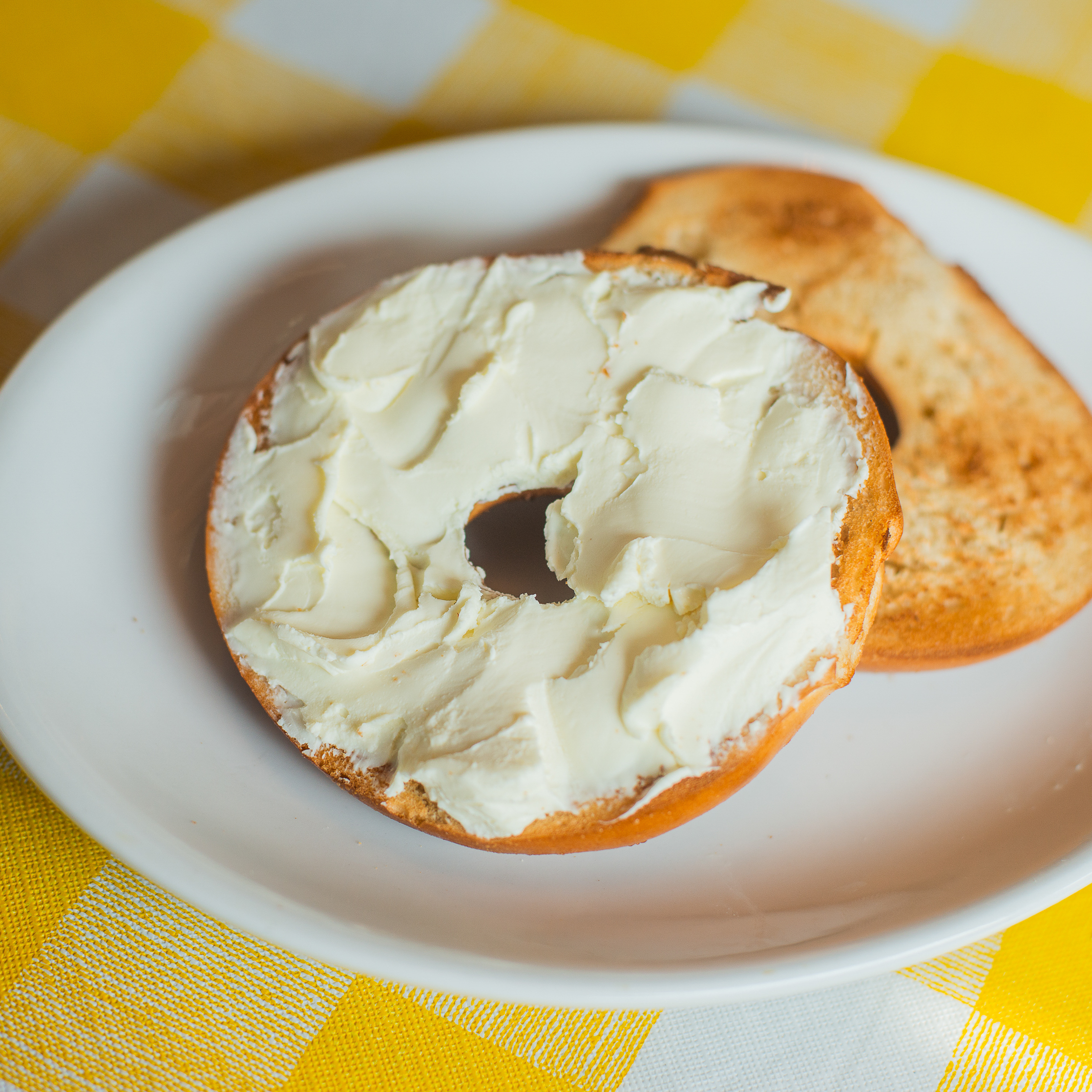 Order Toasted Bagel with Cream Cheese food online from The Breakfast Spot store, Queens on bringmethat.com