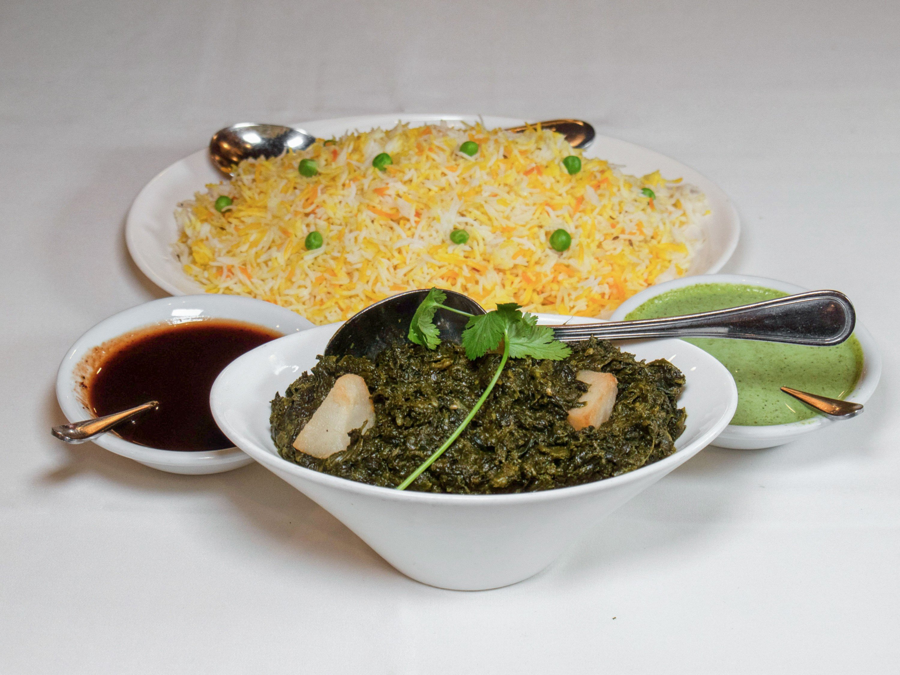 Order 4. Aloo Saag food online from Rajaji Fine Indian Cuisine store, Washington on bringmethat.com