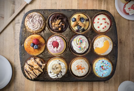 Order Party Park! (1 Dozen Center-Filled) food online from Molly Cupcakes store, West Chester on bringmethat.com