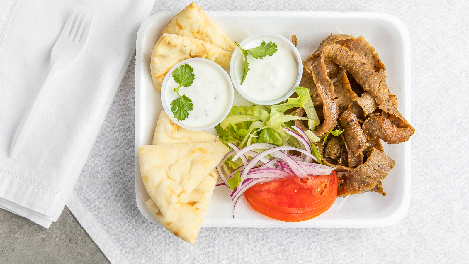 Order Gyro Platter food online from Greek In The Box store, Springfield on bringmethat.com