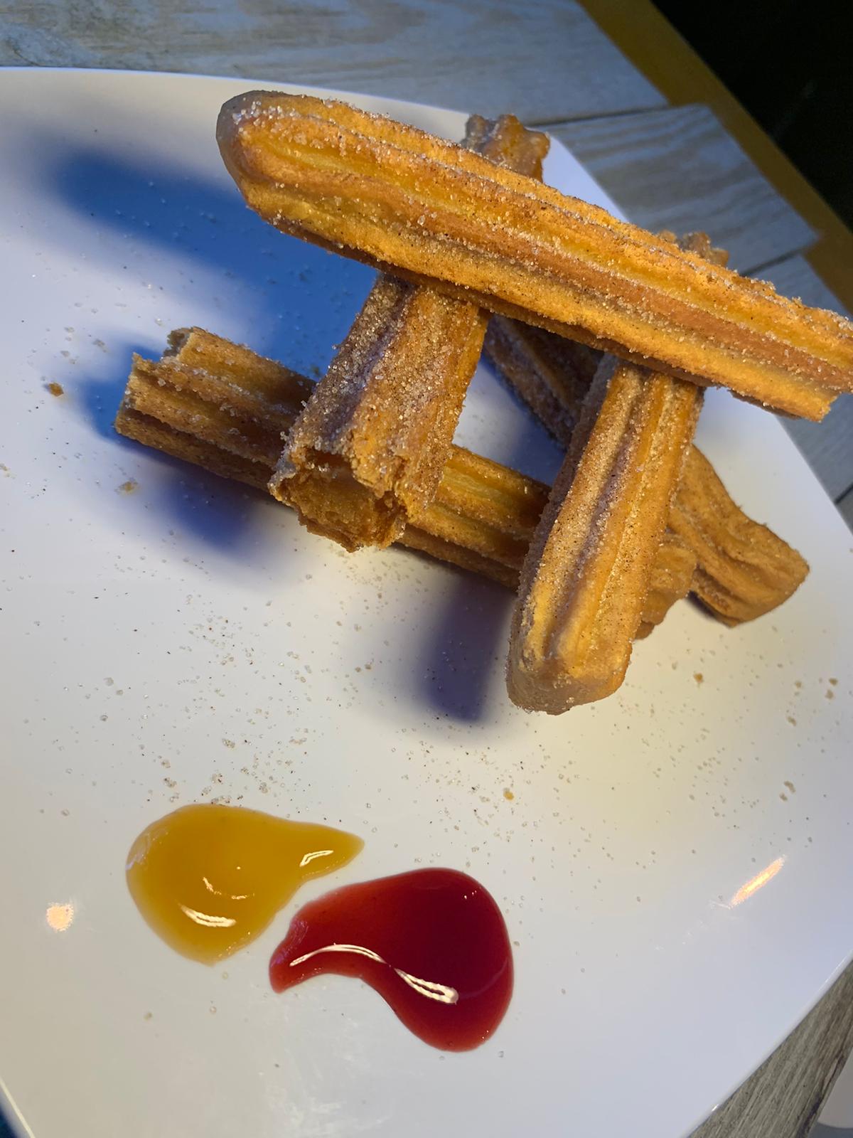 Order Churros food online from Moonrise Spirits And Sushi store, El Paso on bringmethat.com