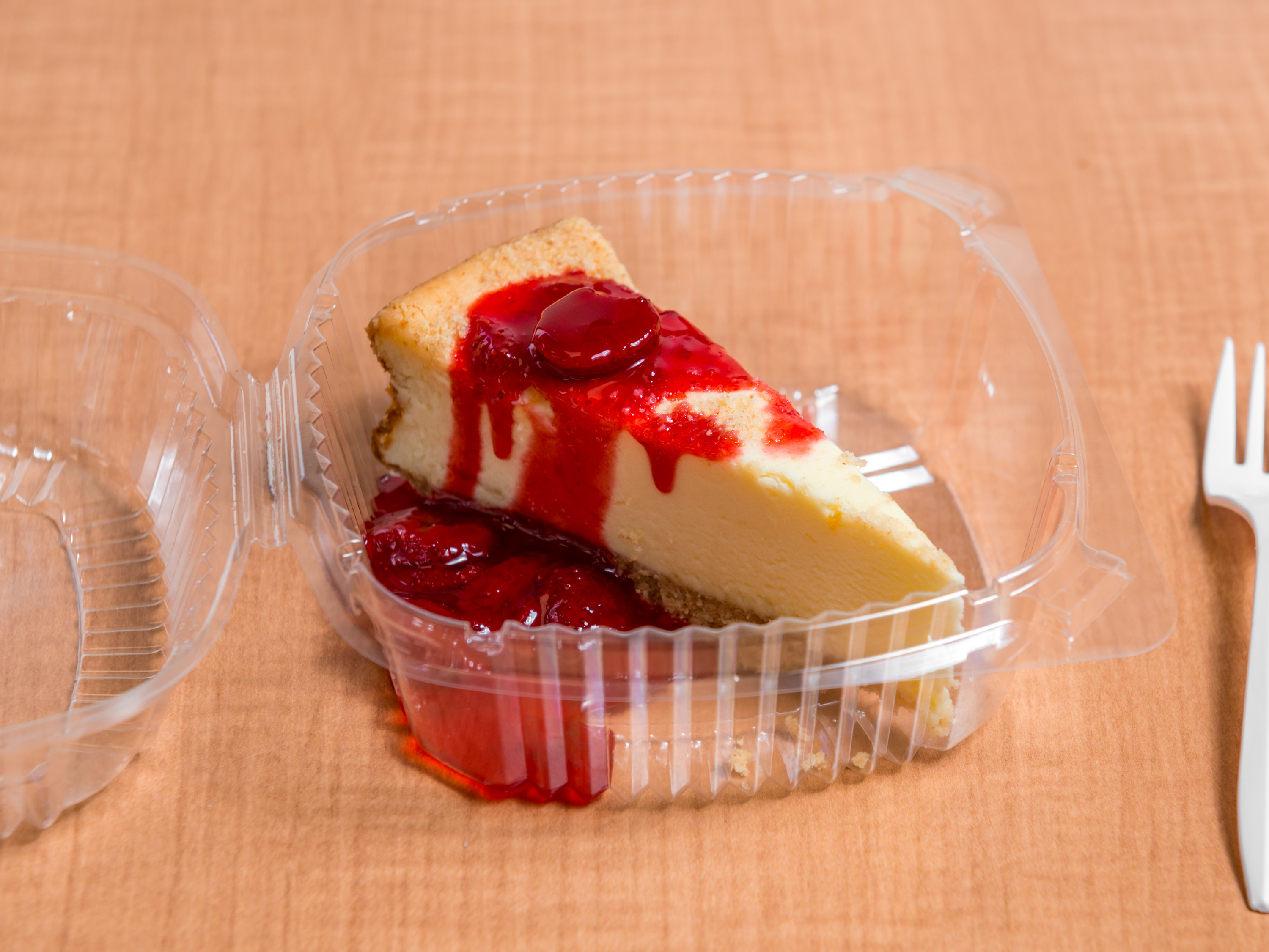 Order Cheesecake with Strawberry Topping food online from Nick's Gyros Seafood IV store, Columbia on bringmethat.com