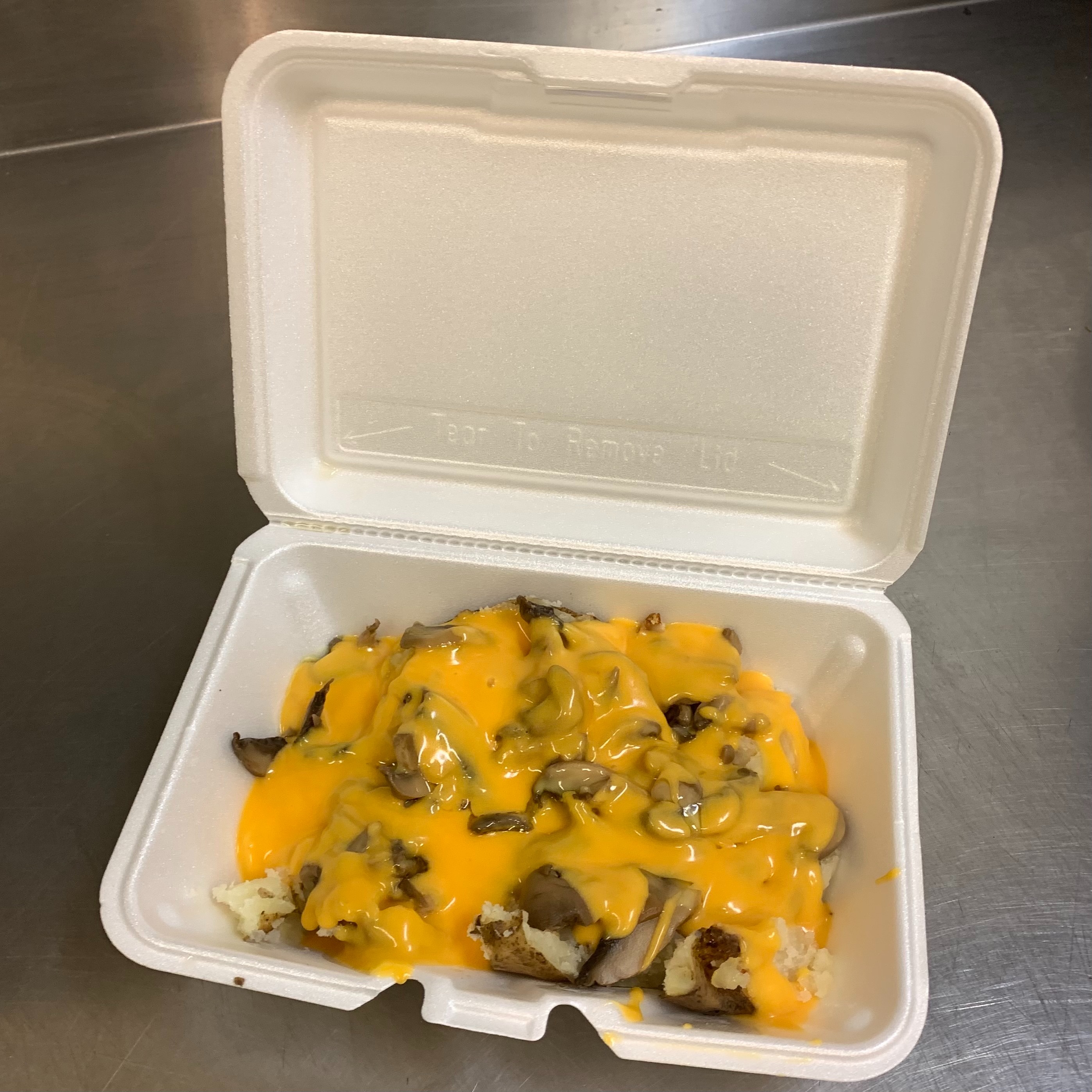 Order 27. Mushrooms, Melted Cheddar Cheese Potato food online from Lieber Boxcar Express store, Galesburg on bringmethat.com