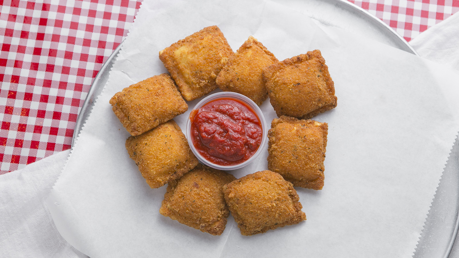 Order Breaded Cheese Ravioli Appetizer food online from Ameci Pizza & Pasta - Lake Forest store, Lake Forest on bringmethat.com