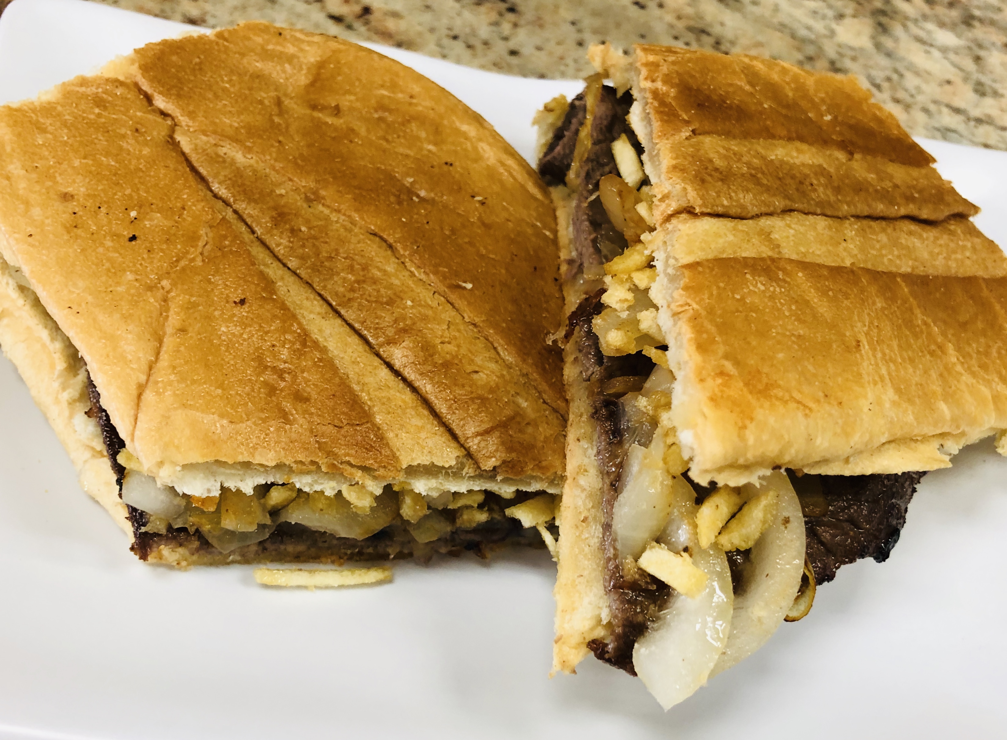 Order Bistec con Cebollas Sandwich food online from Latin cabana store, Astoria on bringmethat.com