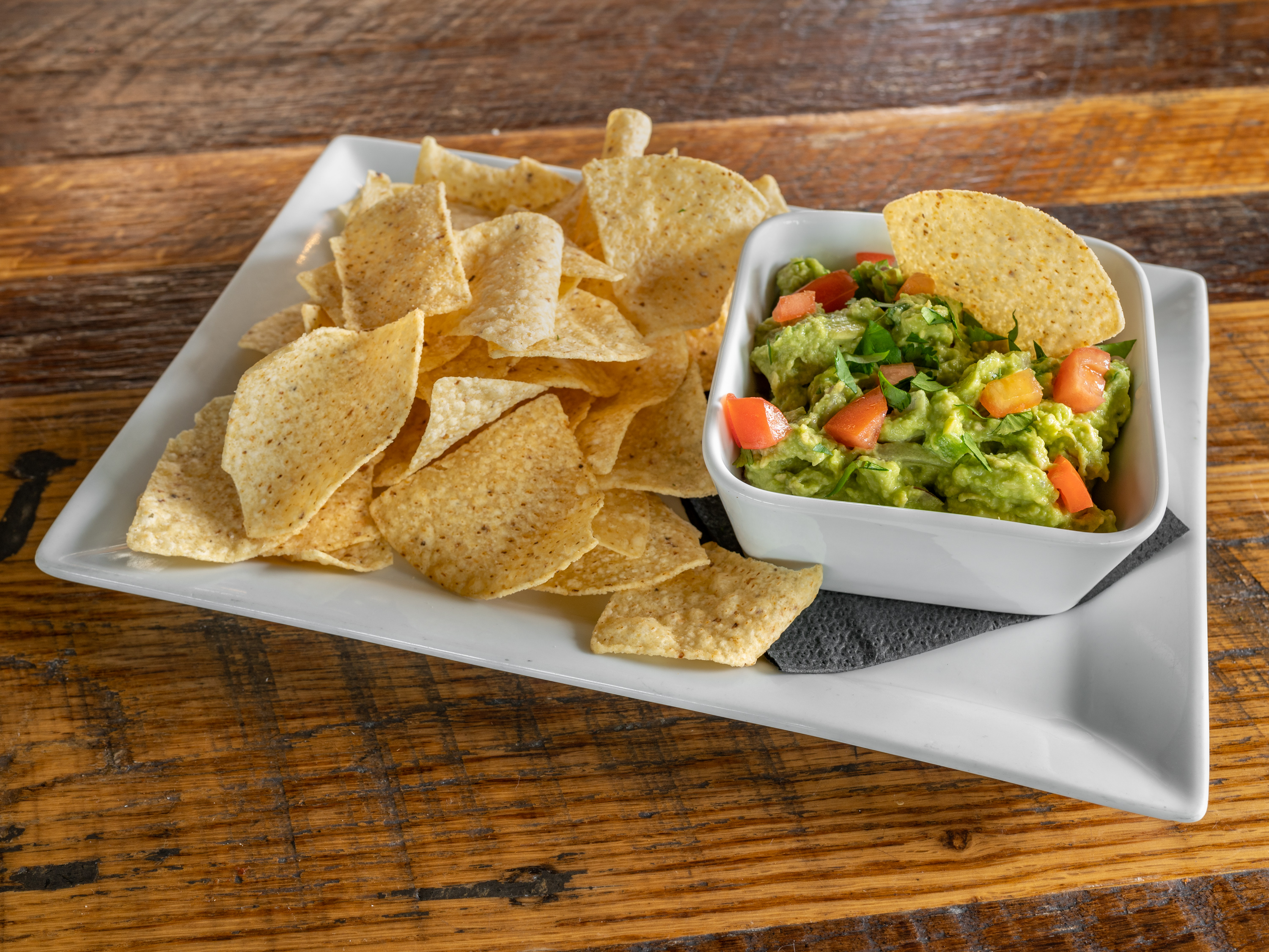 Order Fresh Guacamole and Chips food online from Burger Bach store, Richmond on bringmethat.com