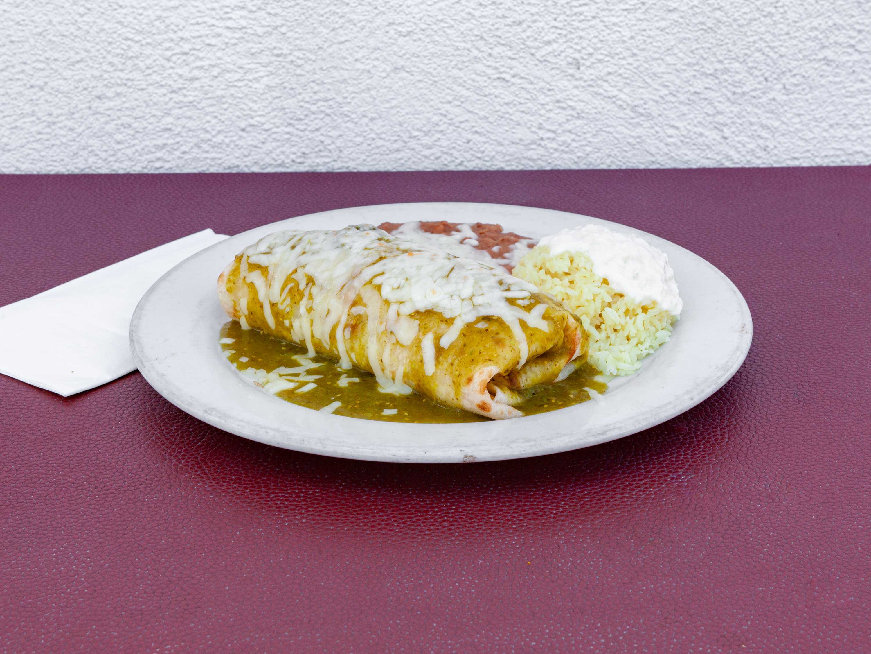 Order Chicken with Green Mole Sauce Burrito food online from Casablanca store, Los Angeles on bringmethat.com