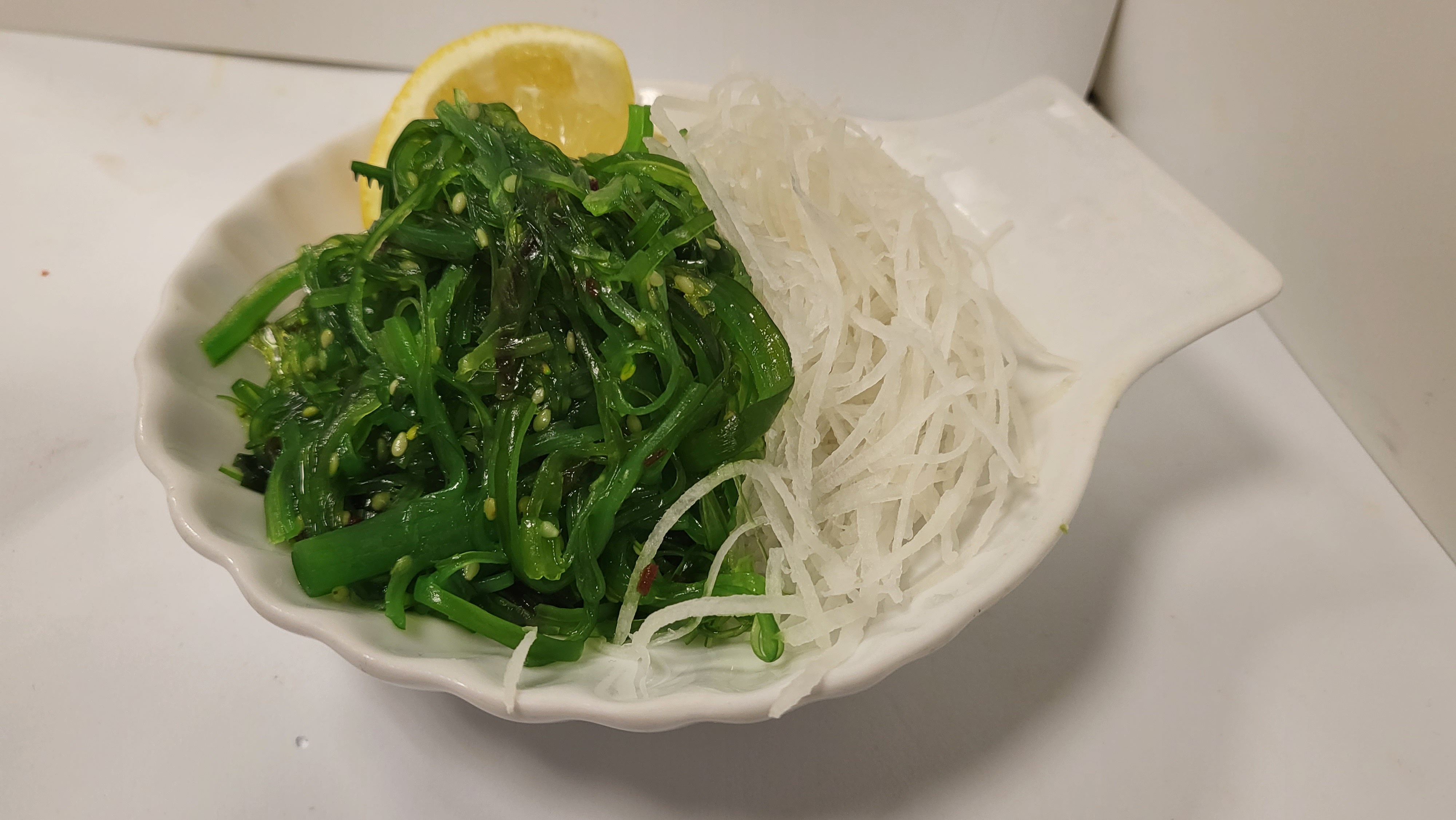 Order Seaweed Salad food online from Sushi Tanuki store, Las Vegas on bringmethat.com